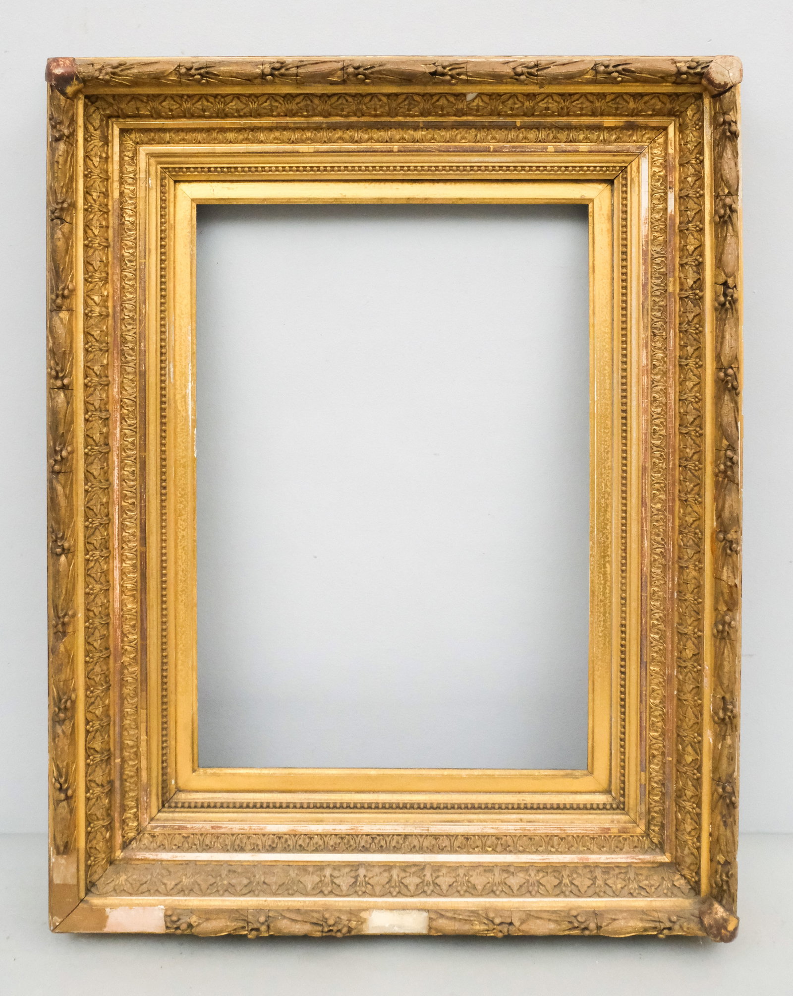 Hudson River School Gilt Frame 14" x 20": American, ca. 1870, having laurel and berry top edge. Overall 23 1/2" x 29 1/2", rabbet 14" x 20", molding 5".