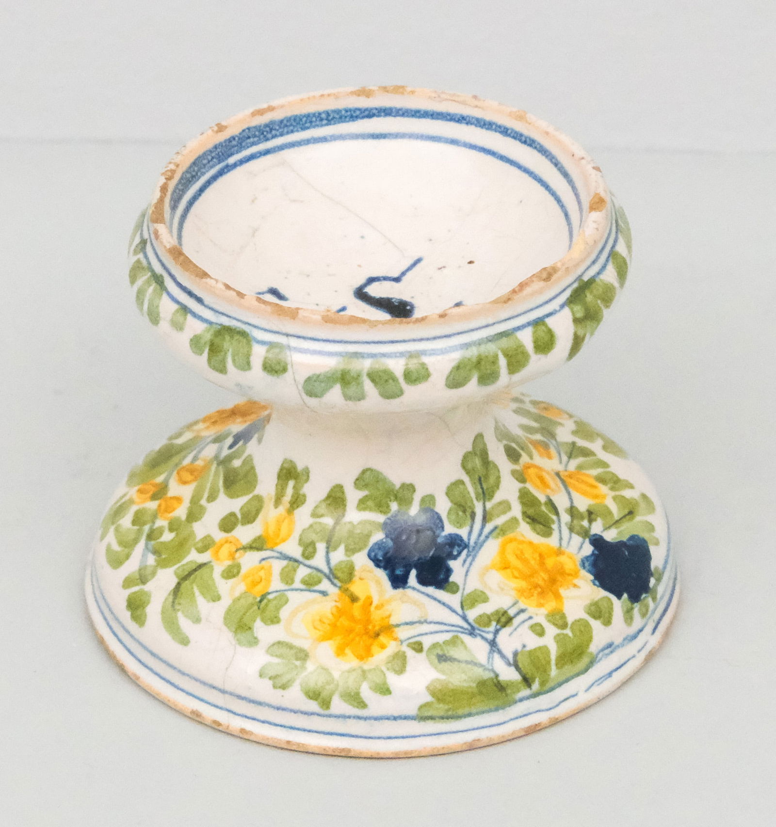 Early Antique Delft Polychrome Salt Cellar: pedestal form in floral decor with cobalt "S" in cellar. 2 1/2" x 3 1/4".