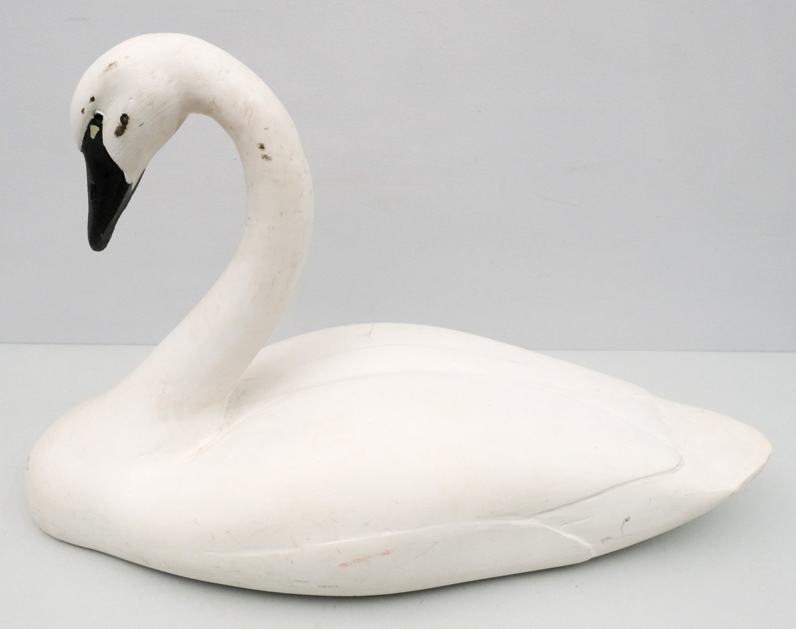 Carved Wooden Swan: 20th century heavy, carved wooden swan, 20 1/2" H x 14" W x 30" L.