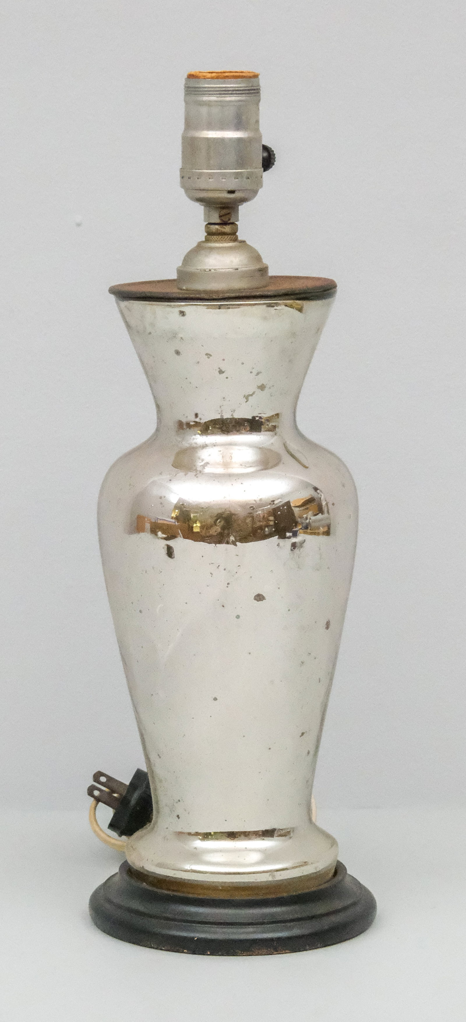 Mercury Glass Lamp: 20th century vasiform mercury glass lamp on turned wooden base, 14 1/2" H x 5" diameter.