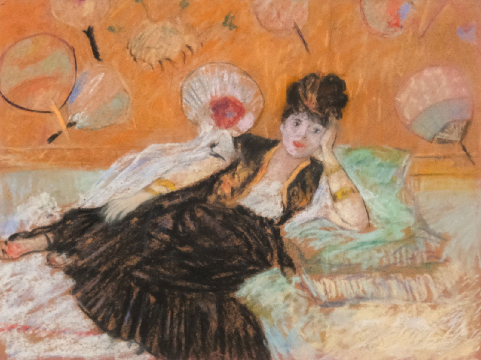 American School, Reclining Woman: American, late 19th century pastel on paper depicting a woman reclining in a room decorated with fans, 8 3/4" x 11 3/4" sight size, 15 1/2" x 18 1/2" framed.