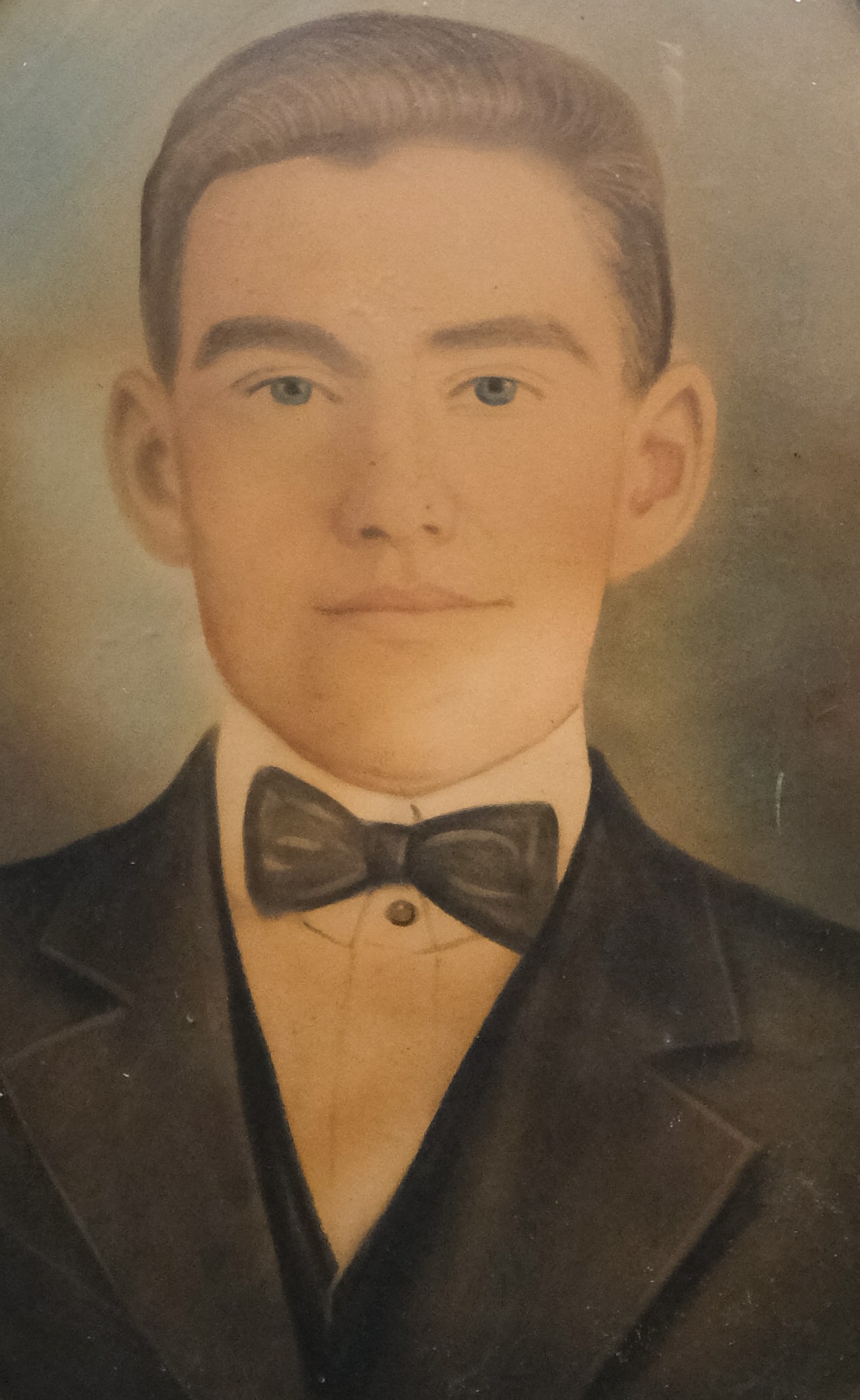 American School, Portrait of a Young Man: American, early 20th century pastel on paper depicting a young man in a bow tie, 18 1/2" x 12 1/2" sight size, 21 1/2 x 16" framed.