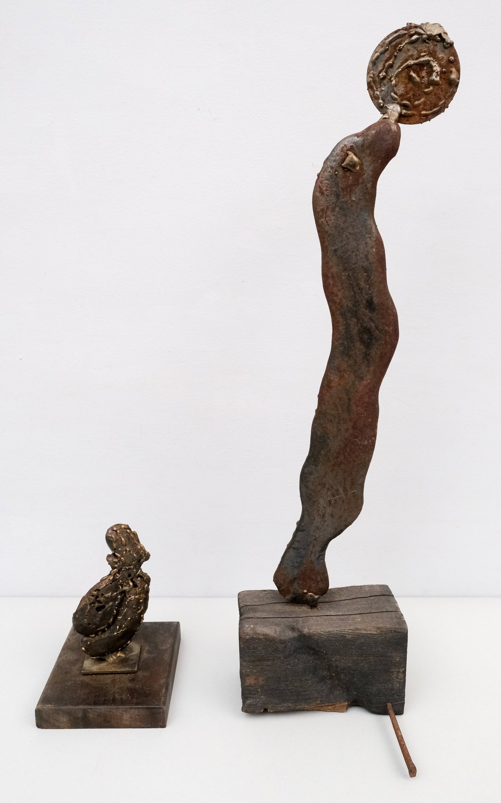 2 Brutalist Metal Sculptures: Abstract forms on wood bases. 6 3/4" and 23"/