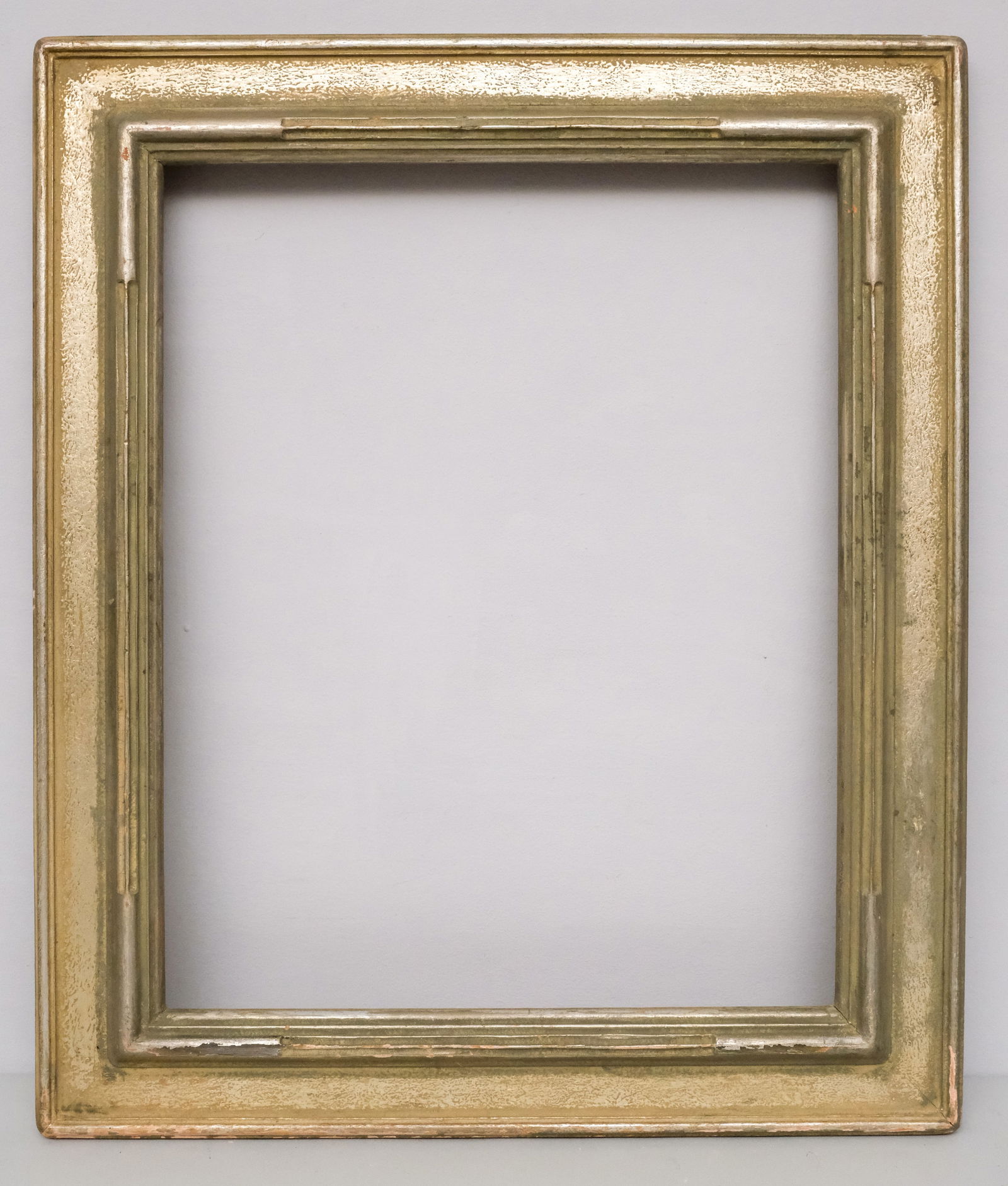 Arts & Crafts Silver Leaf Frame 16" x 20": American, ca. 1930, carved and silver gilded, apparent signature verso of John Fabian Carlson, in a great standard size. Overall 21 1/2" x 25 1/2", rabbet 16" x 20", molding 3".