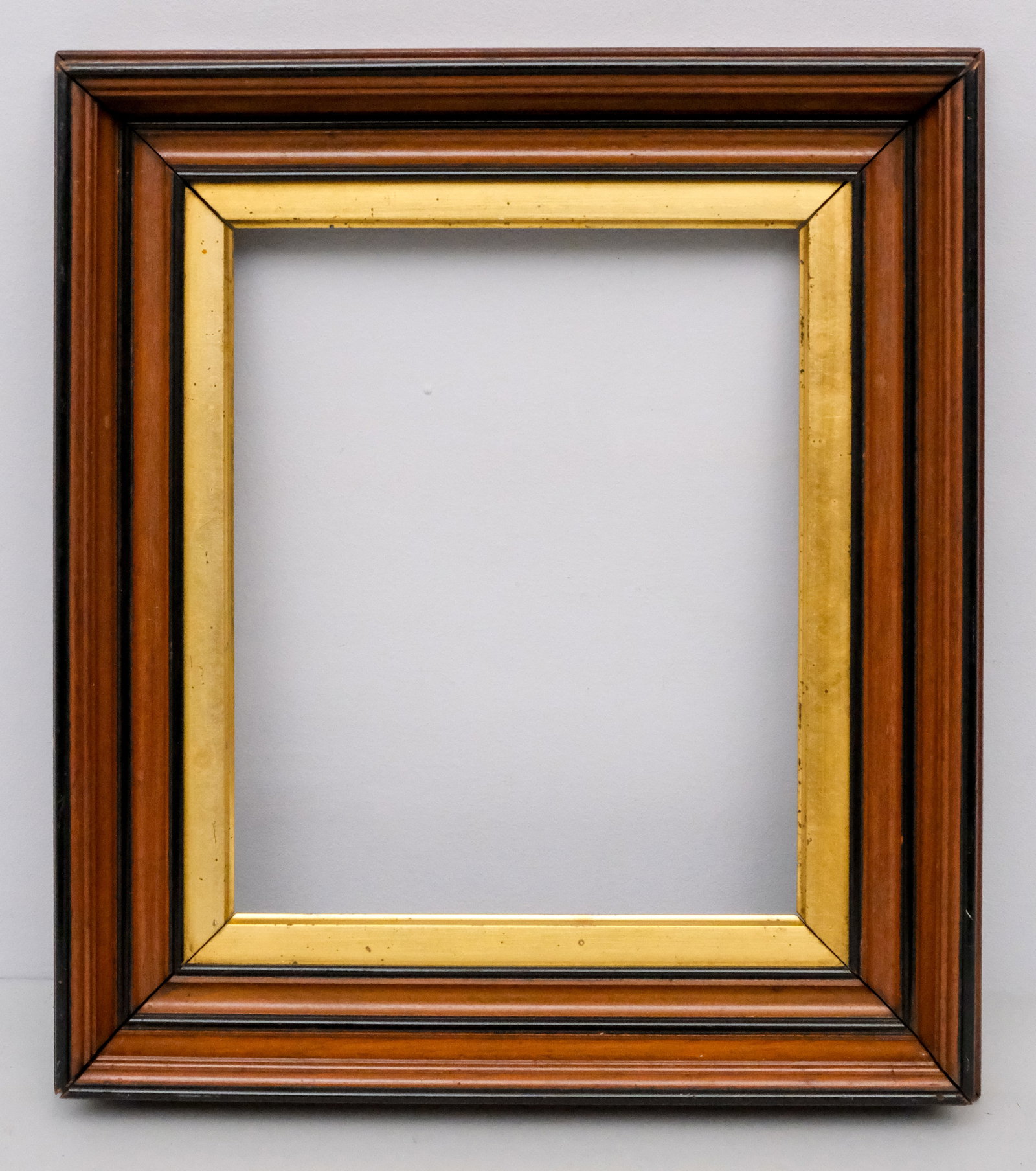 American Walnut Frame with Gilt Liner 9 1/2" x 12": American, circa 1860, walnut frame with lemon gold liner. Overall 15 1/2" x 17 1/2", Rabbet 9 1/2" x 12", Molding 2 3/4".