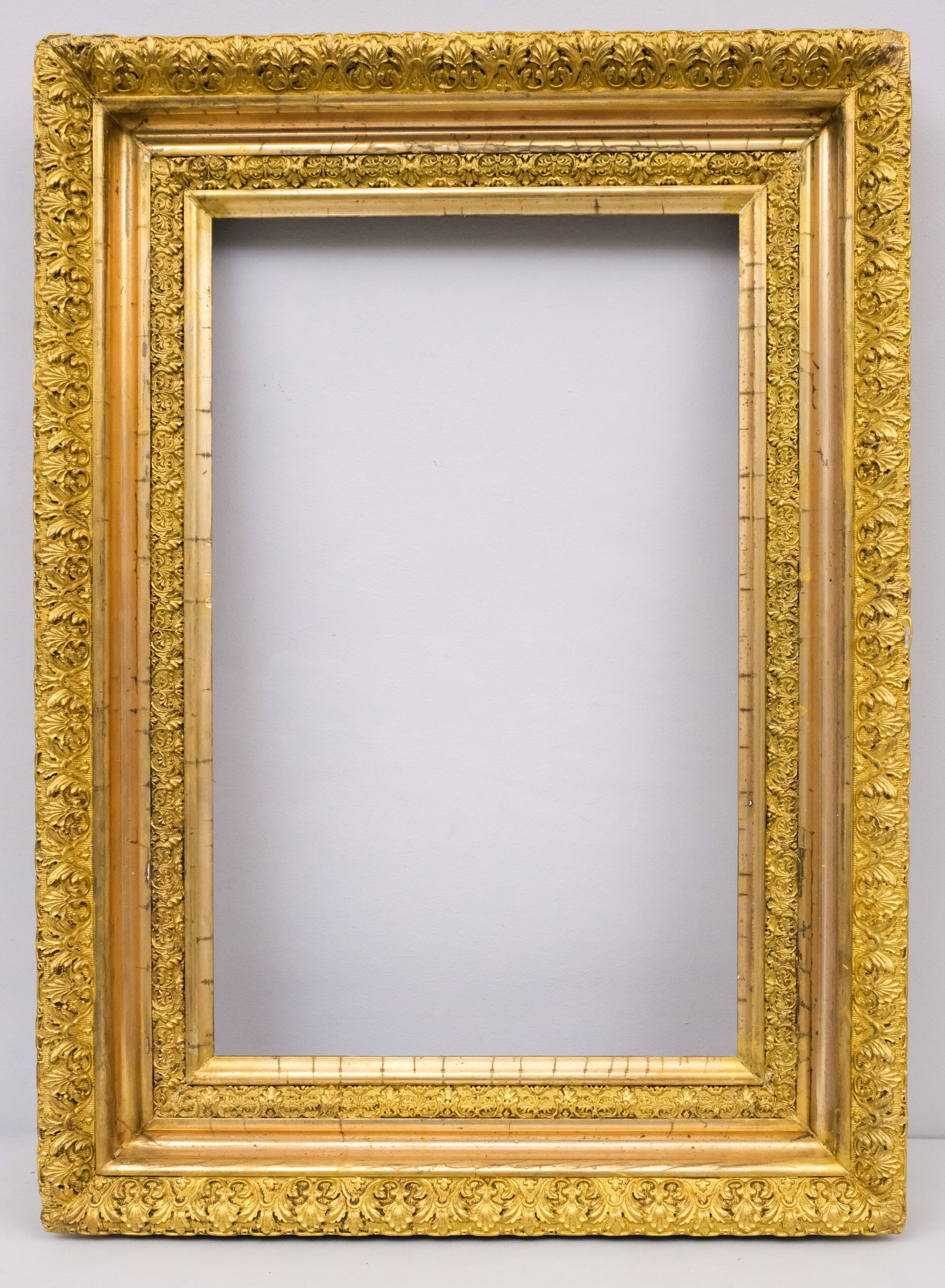 American Hudson River School Frame 14" x 22": American, circa 1880, with an acanthus decorated cove and decorative top edge. Overall 21 1/2" x 29 1/2", rabbet 14" x 22", molding 4".