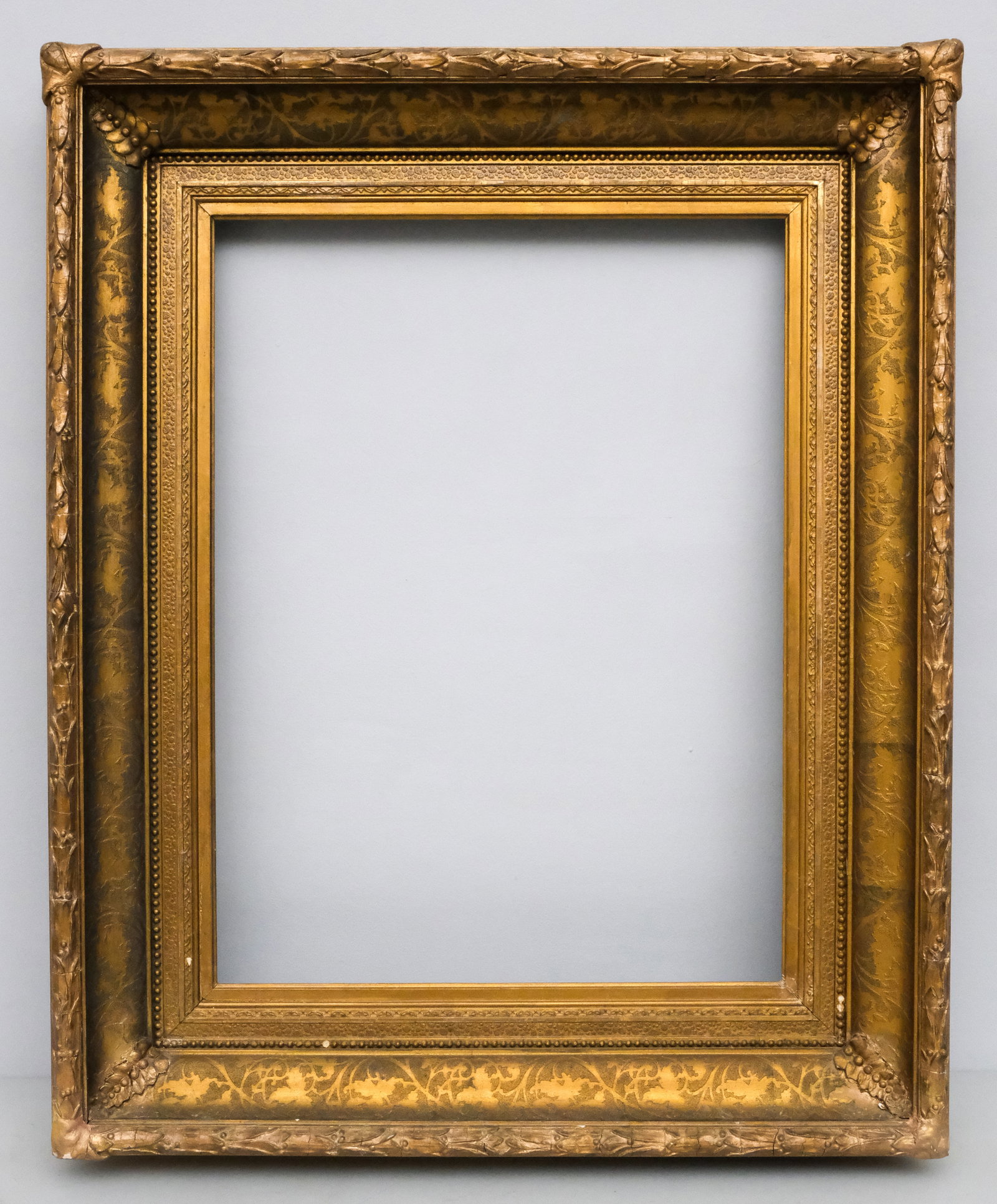 American Sand Foliate Ogee Frame 18" x 24": American, ca. 1870, having sand decorated ogee with laurel and berry top edge. Overall 27 1/2" x 33 1/2", rabbet 18" x 24", molding 5".