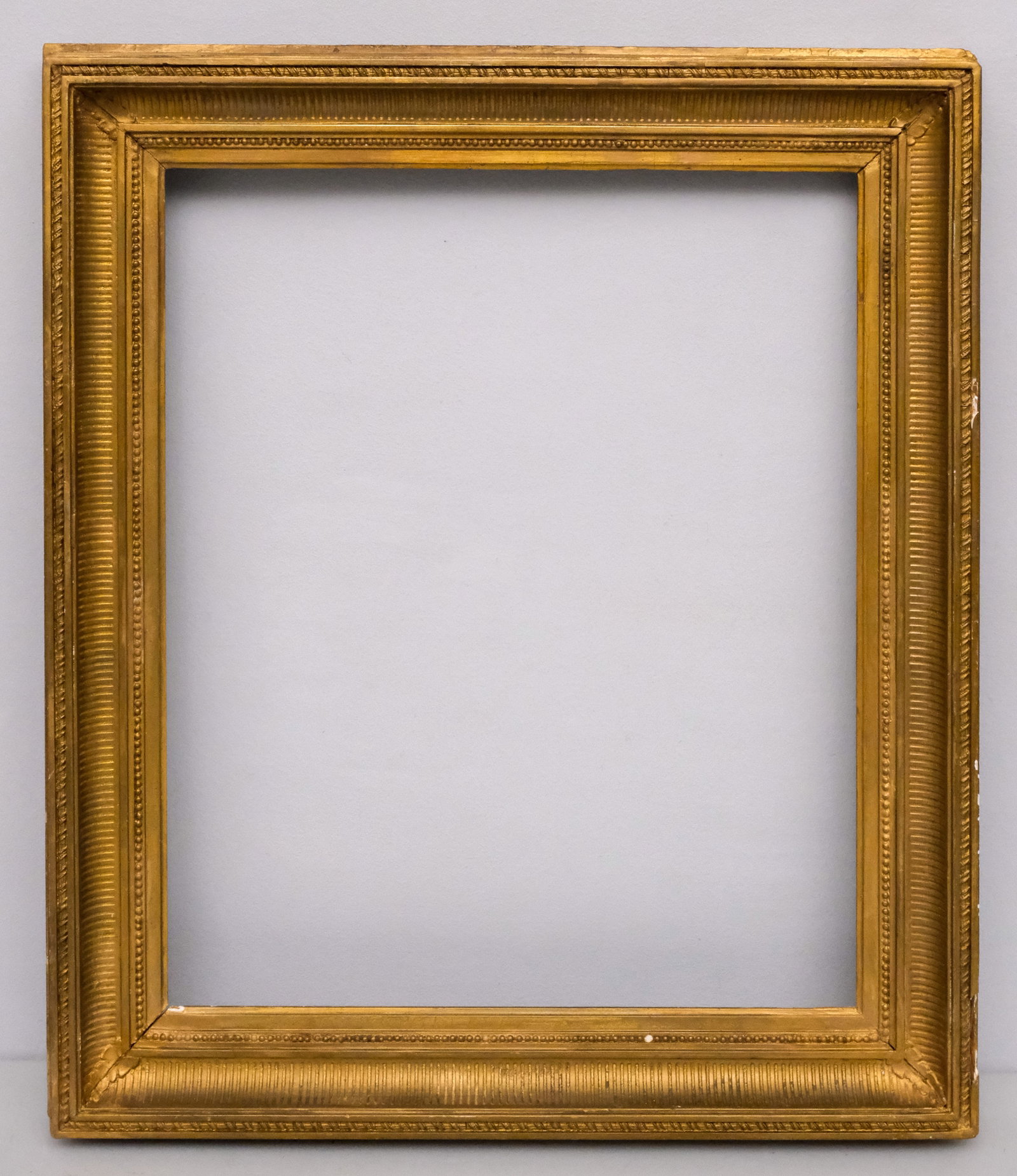 American Hudson River School Frame 14" x 16 1/2": American, ca. 1860, gilded fluted cove frame with flat top edge. Overall 18" x 21", rabbet 14" x 16 1/2", molding 2 1/2".