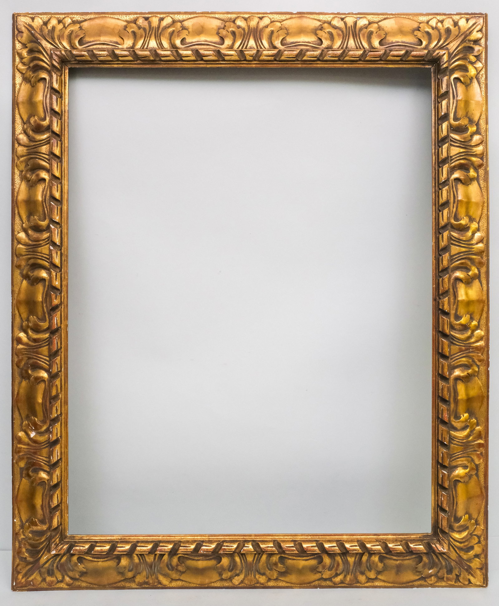 Italian Giltwood Frame 24" x 30": Italian, ca. 1930, nicely carved and gilded baroque style frame, having reverse profile. Overall 31" x 37 3/4", rabbet 24" x 30", molding 4".
