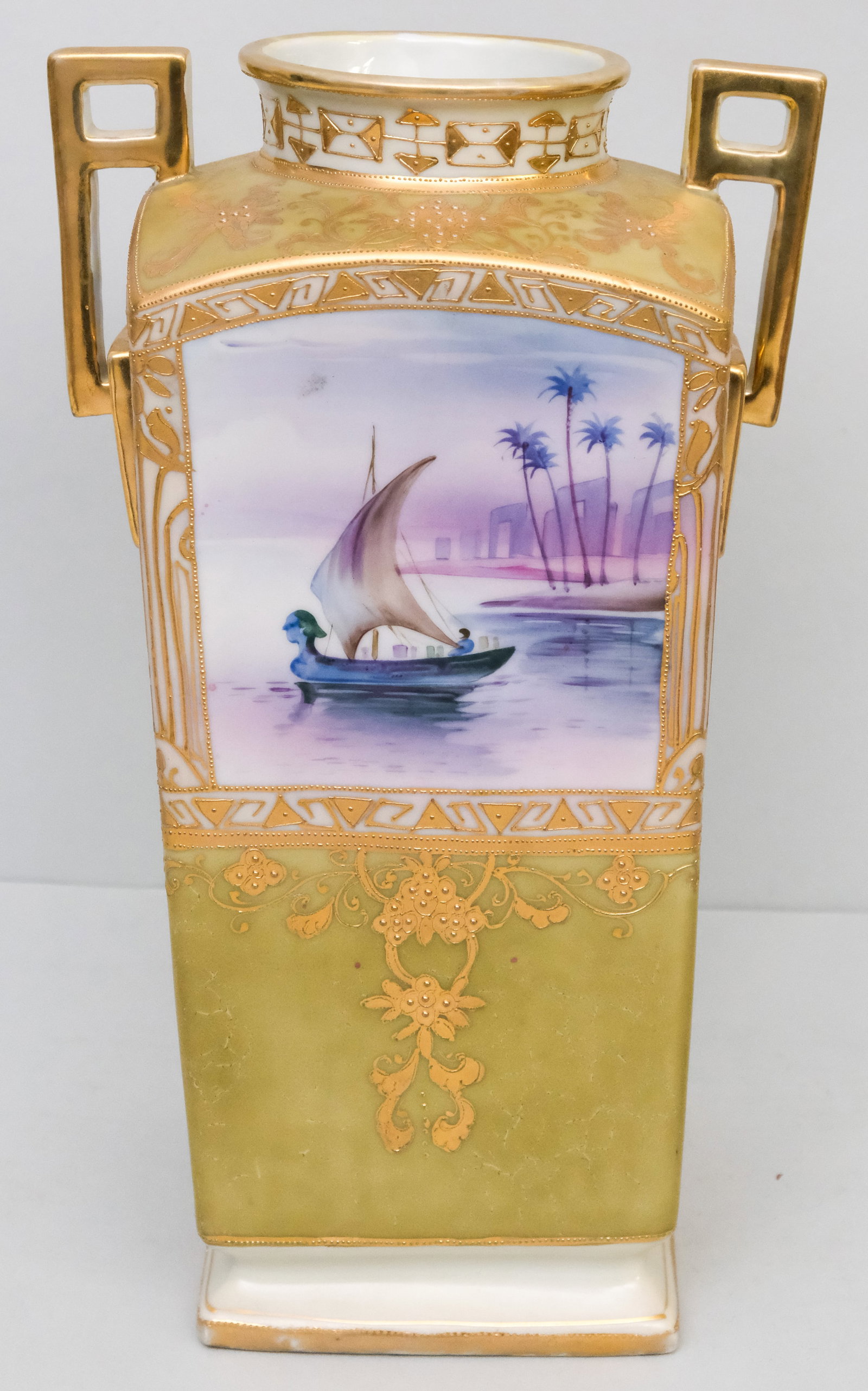 Large Antique Morimura Gumi Nippon Porcelain Vase: With orientalist ring handles and boat scenes. 13 1/4".