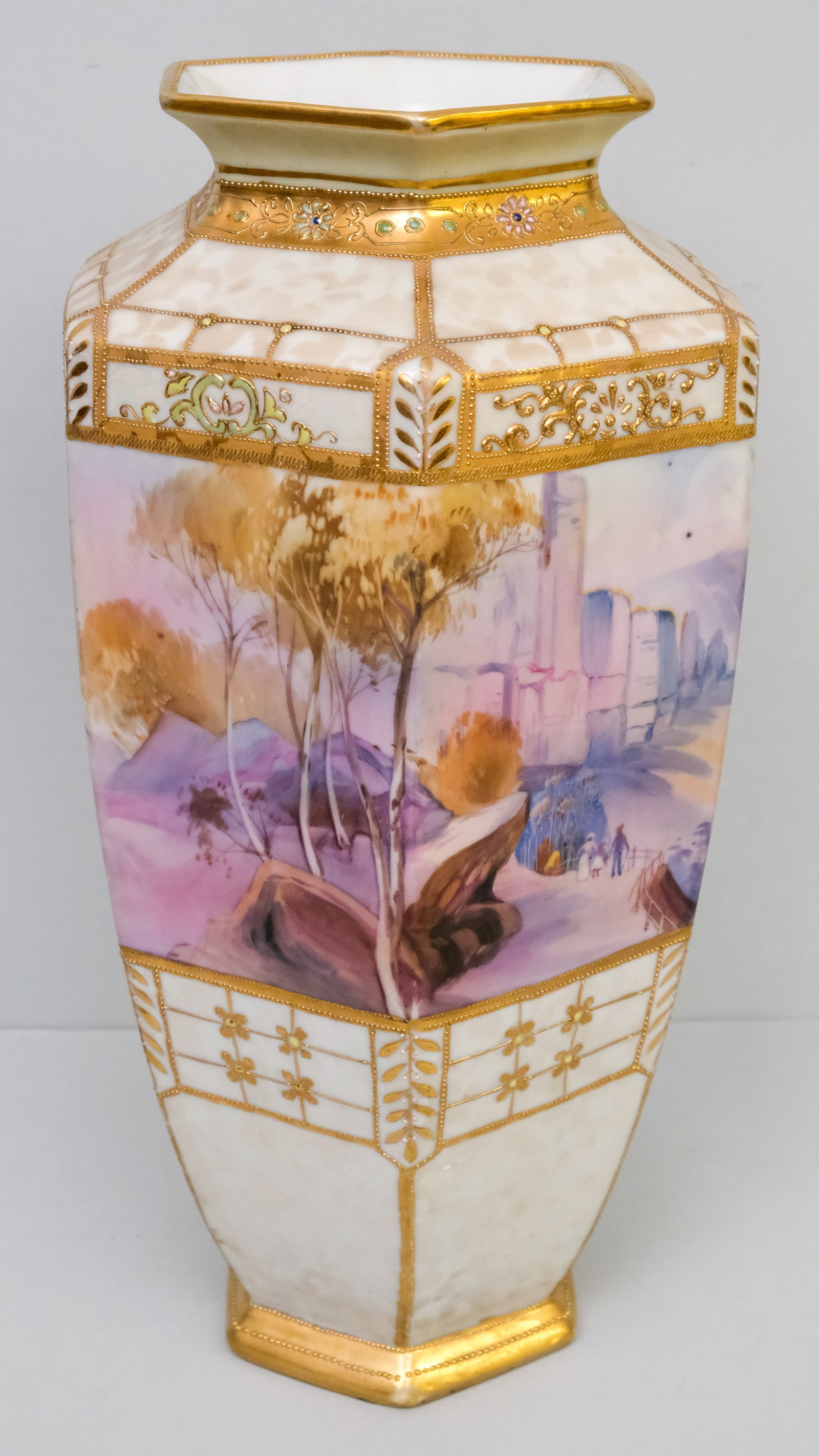 Large Antique Morimura Nippon Porcelain Vase: Hexagonal form with Moriage enameling and canyon scene surround. 15" tall.