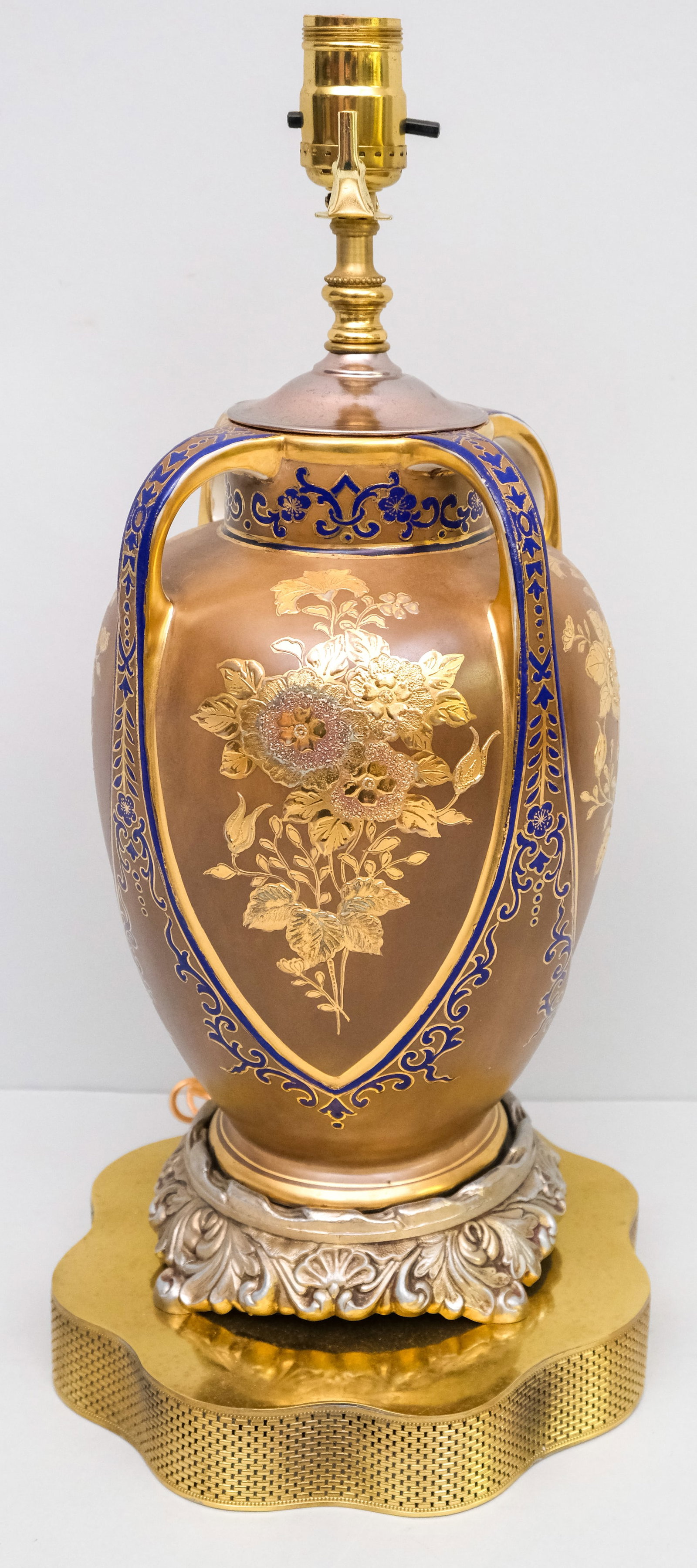 Antique Nippon Moriage Porcelain Lamp: Large four-handled vase with cobalt blue accents. With later secondary mounts. 18 1/2".