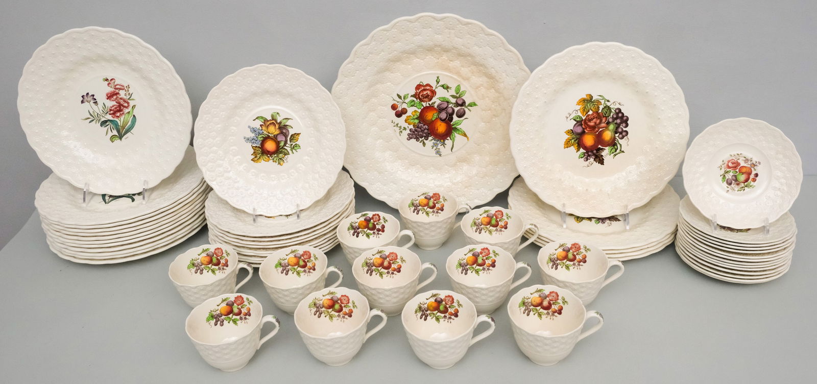 Large Spode Service Alden Pattern: Comprising (17) dinner plates, (10) salad plates, a charger, (12) cups and (14) saucers.
