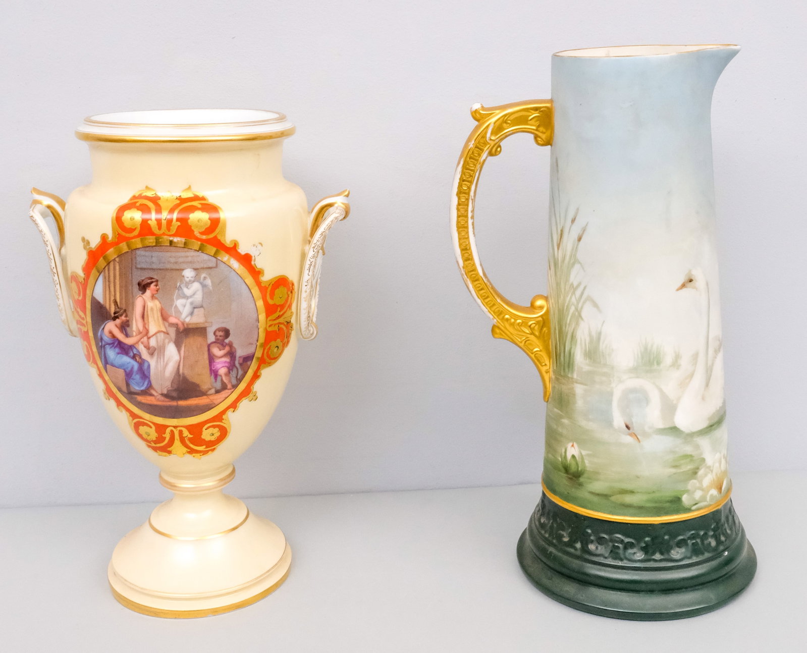 American Belleek Porcelain Swan Pitcher: With gilded handle. Together with a French porcelain vase with neoclassical motif. Pitcher 14".