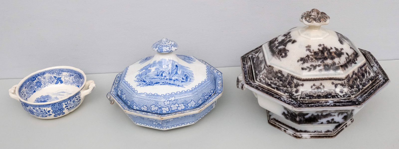Group of Antique Transferware Porcelain: Mostly blue & white Staffordshire, together with a cream soup bowl by Villeroy & Boch and a dark mulberry covered vegetable dish. Mulberry 10" x 10".