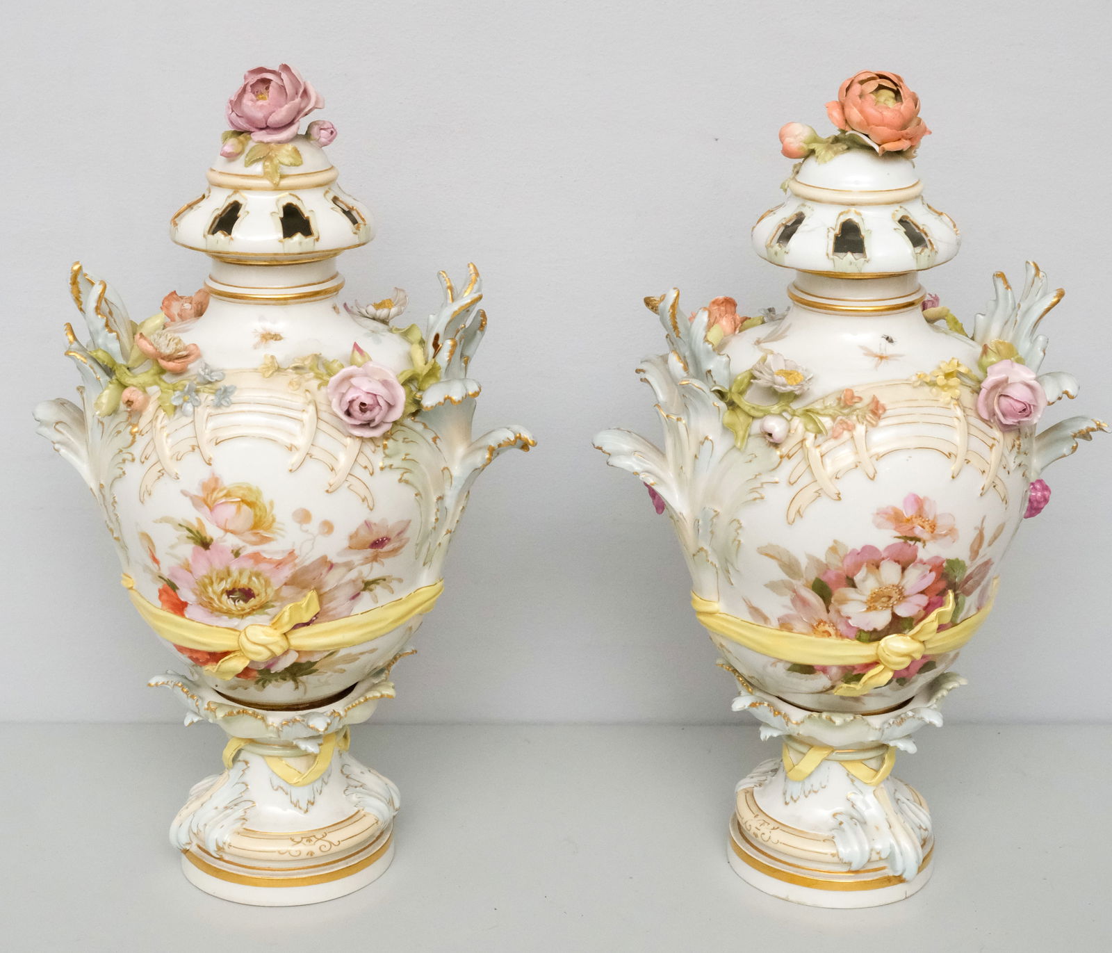 Pair Antique KPM Porcelain Potpourri Vases: Decorated with flora and insects, featuring applied flowers. 12 1/2".