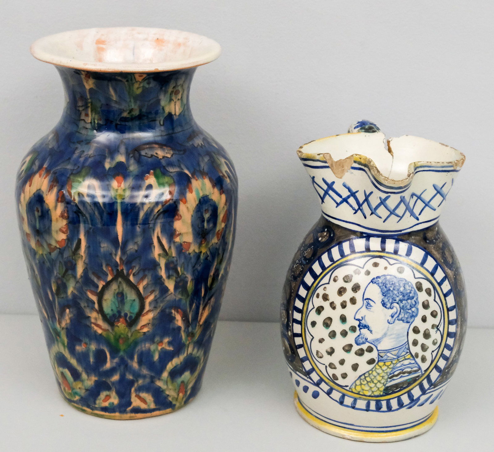 Iznik Type Pottery Vase & A Delft Pitcher: The pitcher with side profile portrait of armored man. Marked as shown. Vase 10 1/2".