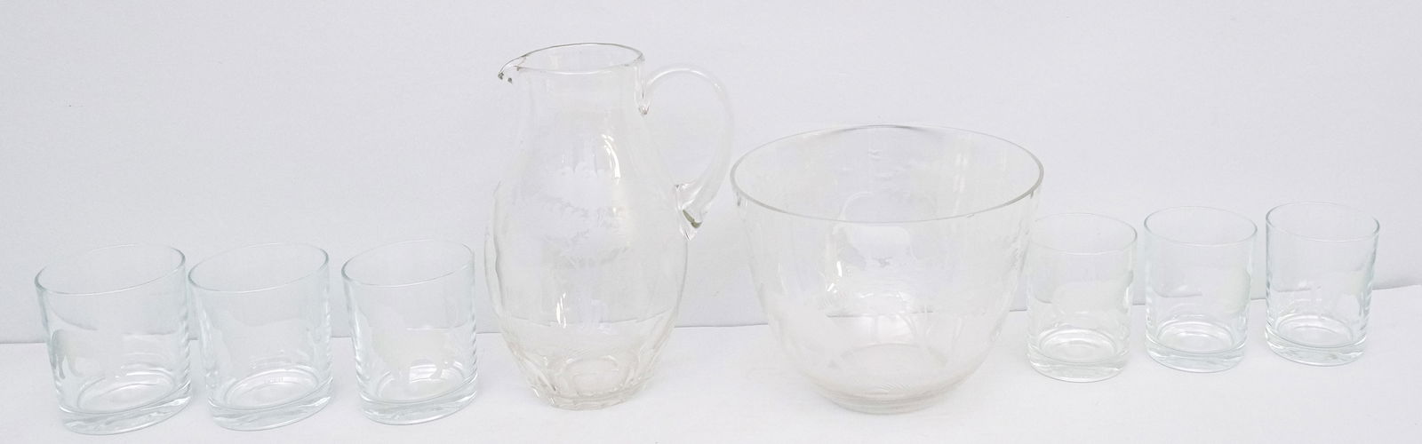 Queen Lace African Crystal Water Pitcher & Bowl: Pitcher decorated with giraffe and the large bowl with elephant (bowl with rim chip), together with 6 French old fashioned glasses with various big cats. Pitcher 9 1/4".