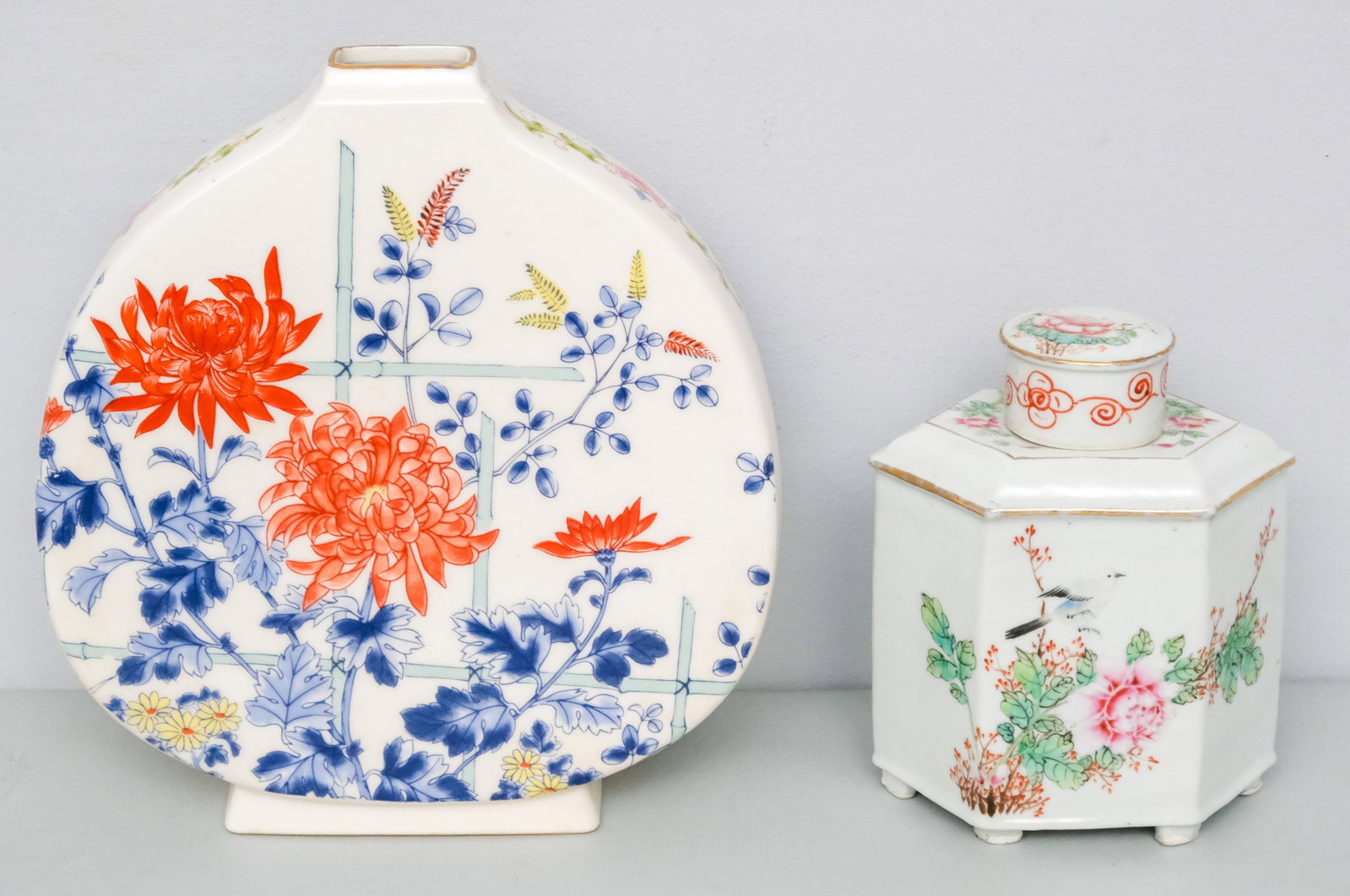 2 Pieces of Antique Chinese Porcelain: Comprising a moon vase with floral decor and a tea caddy (hairline to lid). 6 1/4" to 9 1/4".