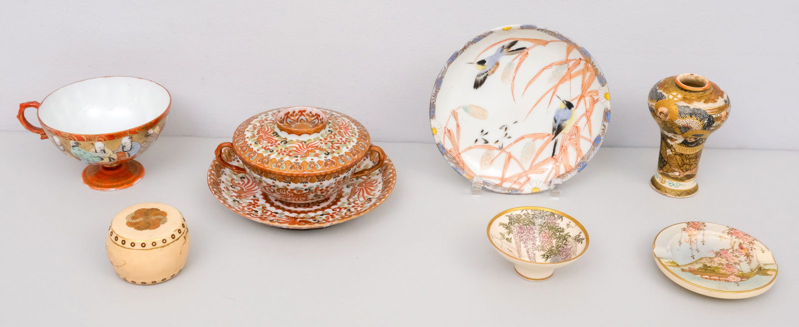 Collection of Antique Japanese Cabinet Porcelain: Including some fine satsuma articles; A drum form box, cabinet vase, and small wisteria bowl. Together with various articles.