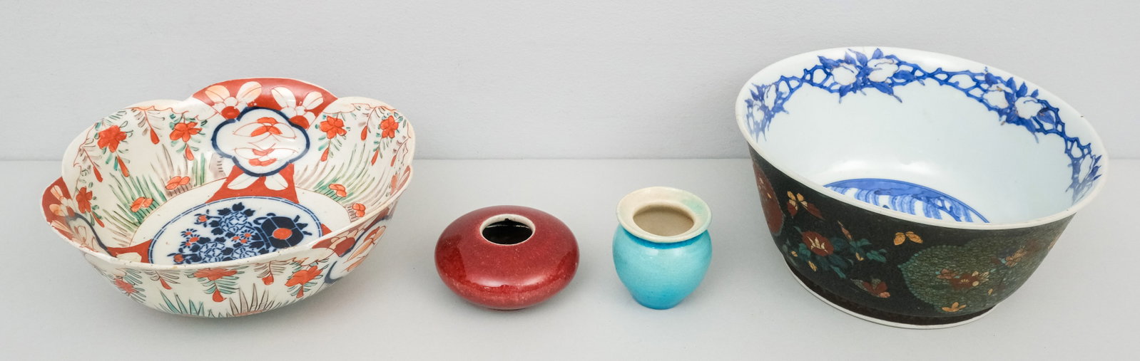 Group of Japanese & Chinese Porcelain: Comprising a cloisonne-on-porcelain palette glazed bowl with deer, an Imari bowl, a robins egg blue bowl, a sang de boeuf bowl.