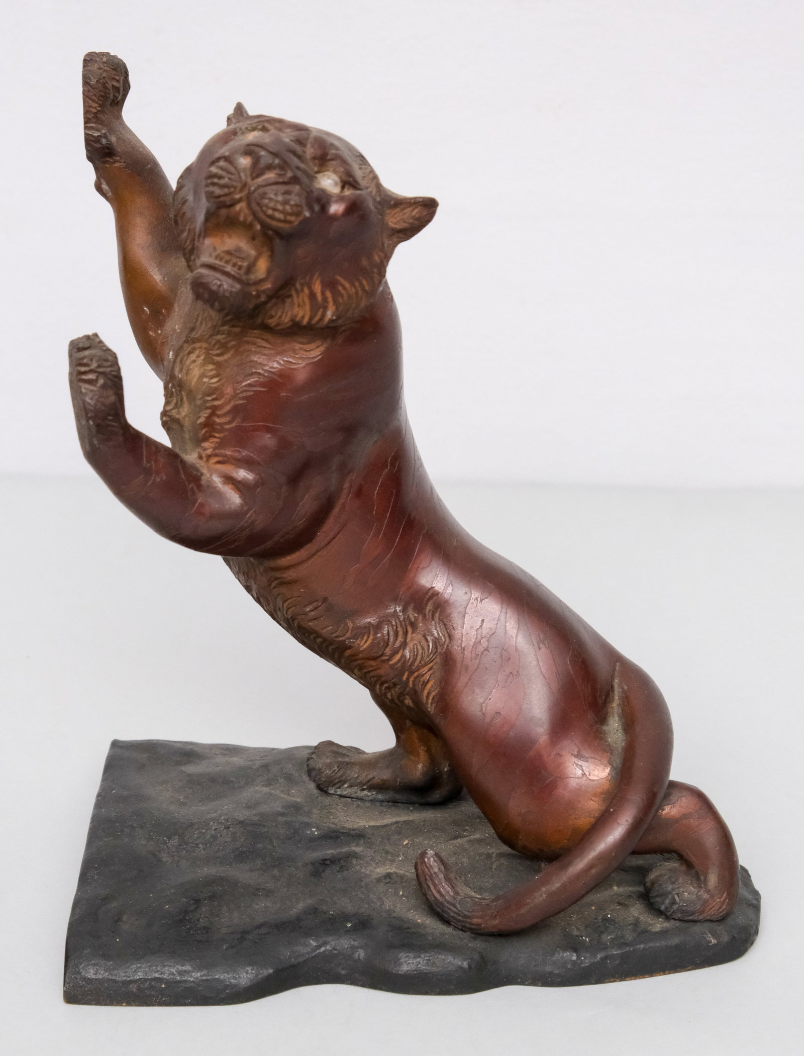 Antique Japanese Bronze of a Rampant Tiger: With glass eyes and silent roar. 6 3/4" x 8".