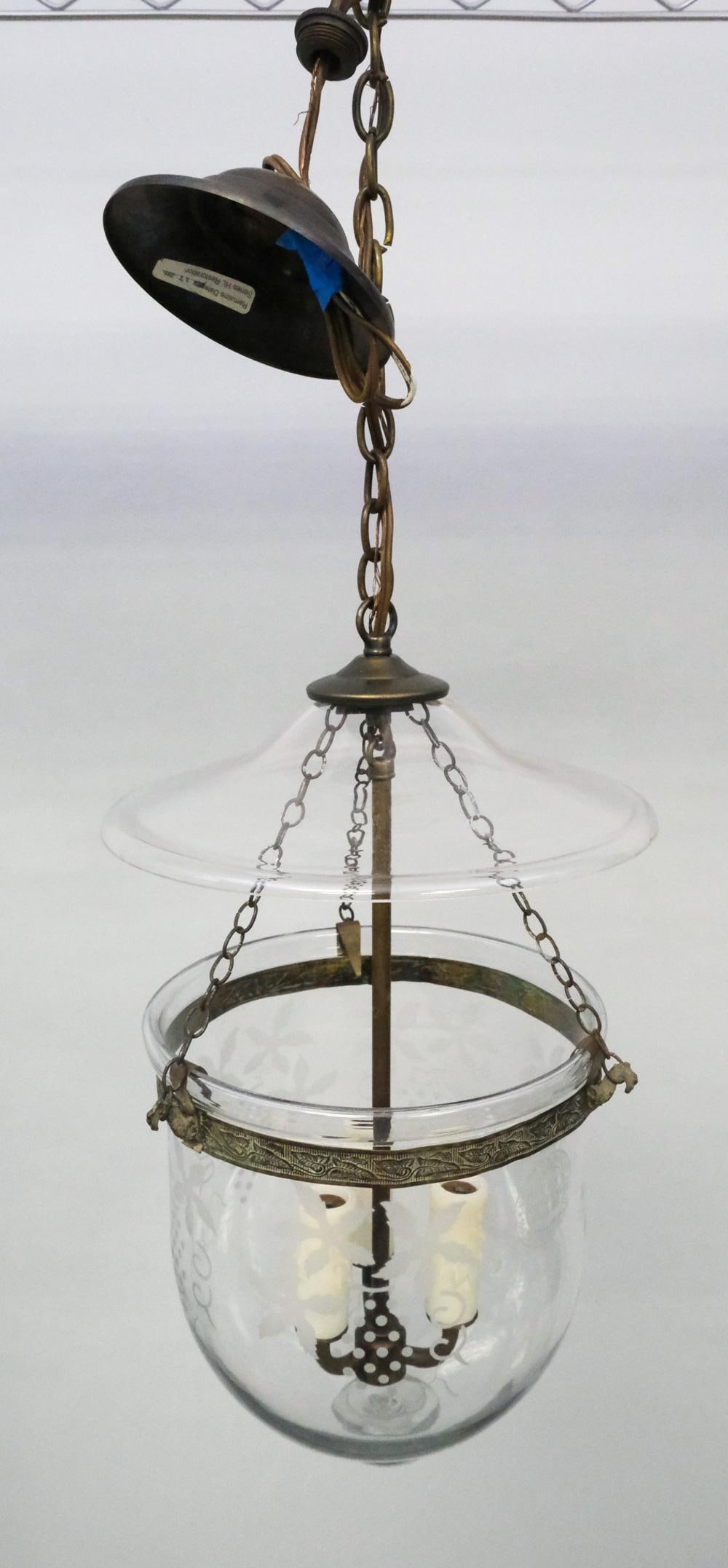 Val St. Lambert Crystal Bell Jar Hanging Lamp: 19th century crystal bell jar hanging lamps with brass trim, marked "De Grelle", "Val St.Lambert", "Best Crystal Glass", and "Made in Belgium", 22" H x 10 1/2" W x 10 1/2" L.