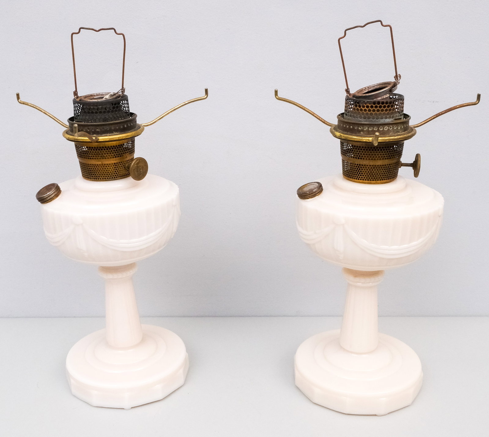 Pair Alacite Lincoln Drape Aladdin Mantle Lamps: Oil lamps with molded swag decor. 16 1/2".