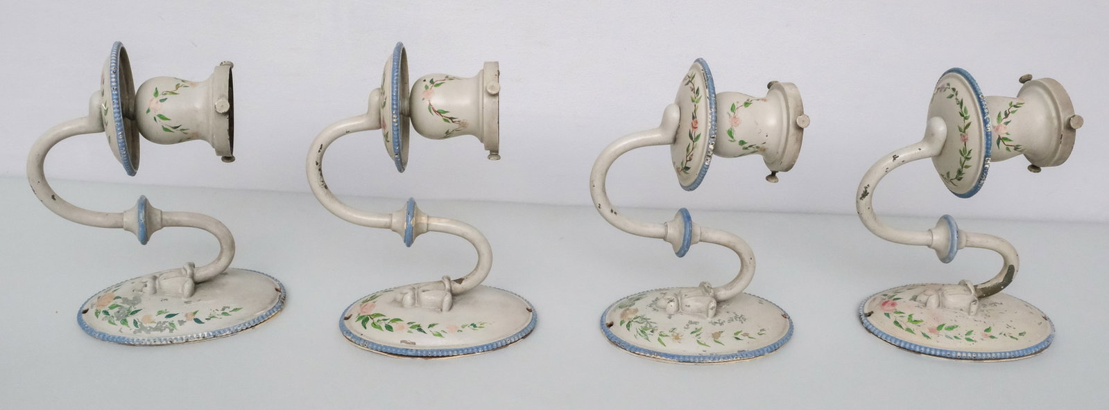 Set Four Antique E.F. Caldwell Wall Sconces: Floral decorated on a field of cream and blue. Marked as shown. 4 1/4" x 9"