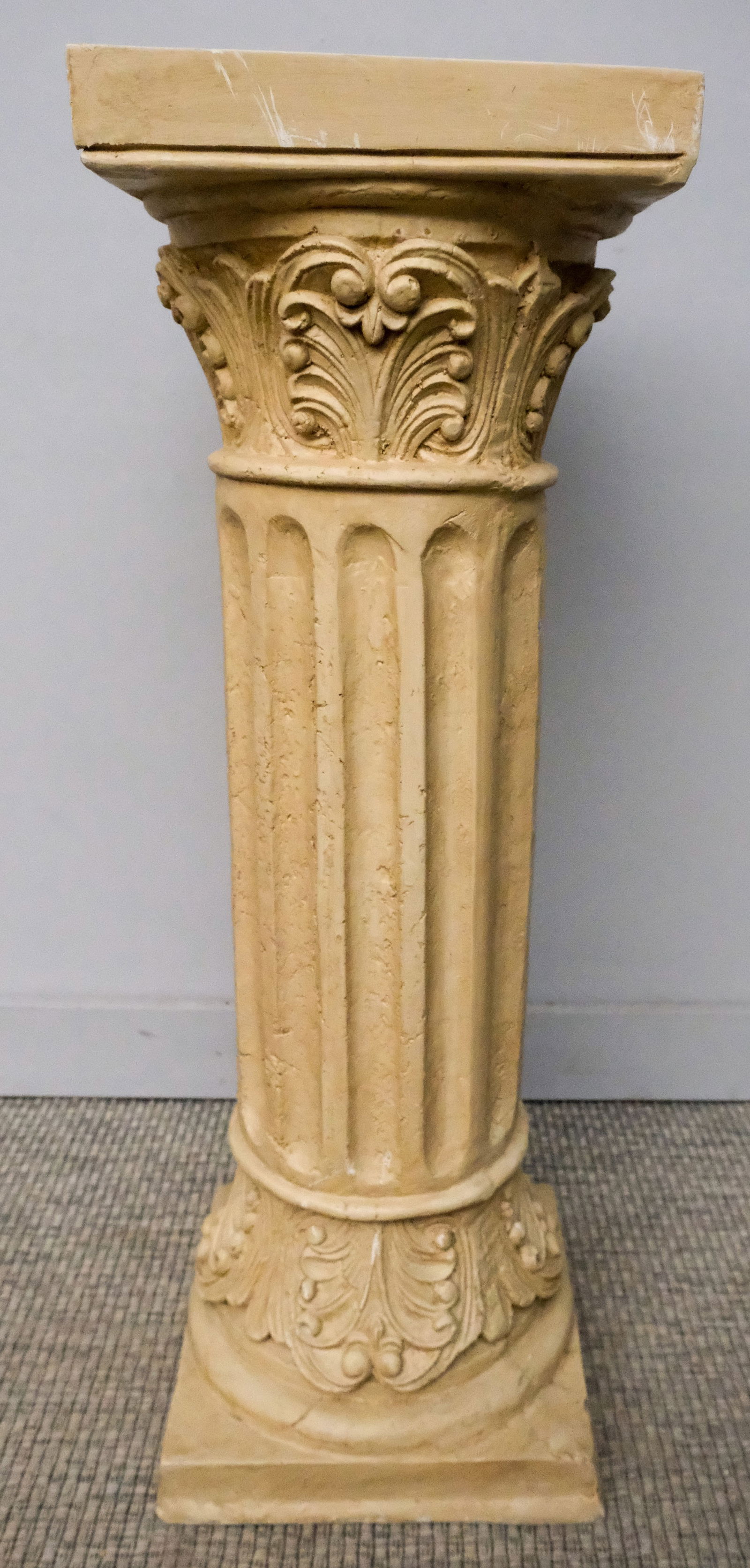 Cast Corinthian Column Stand: Early 20th century cast plaster, fluted, Corinthian column stand, with acanthus capital and square top, 36 1/2" H x 12 1/2" W x 12 1/2" L.