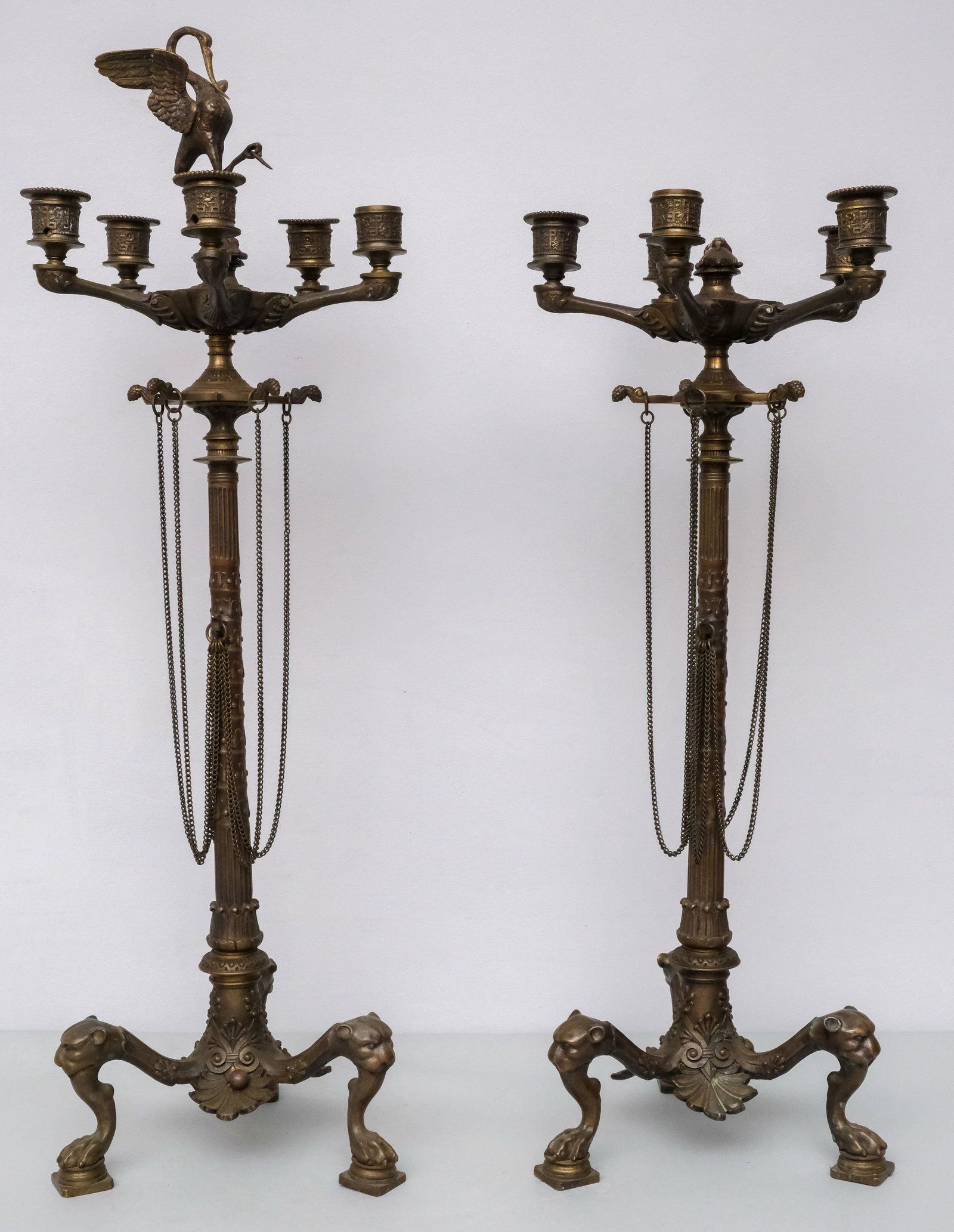 Pair of Bronze Aesthetic 5-Socket Candelabras: Lion head and paw feet and stork on tortoise finials. 28"