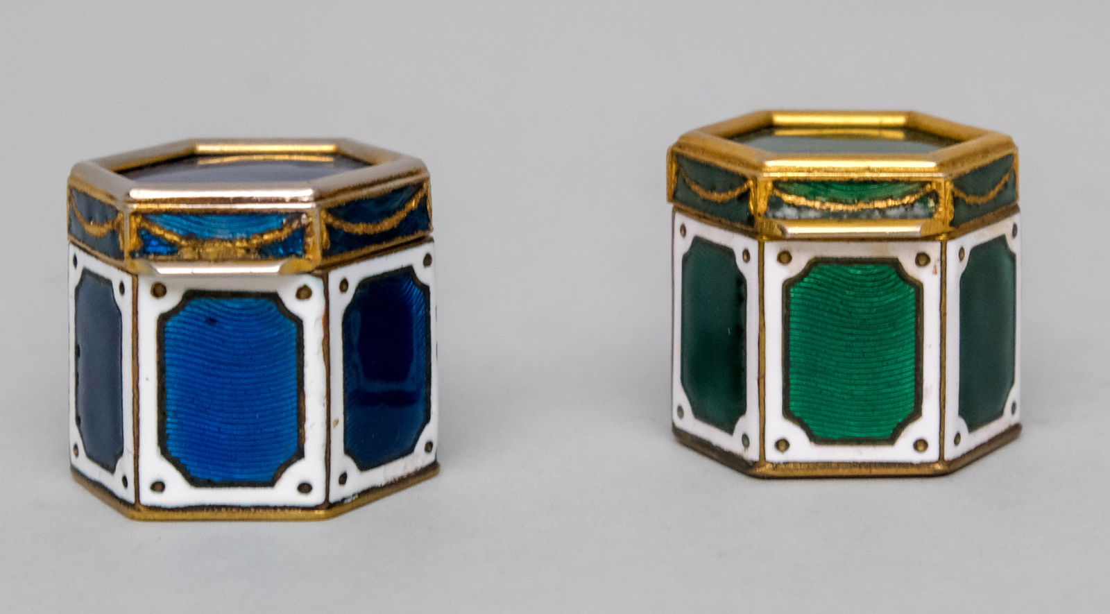 Pair of Enameled Brass Pill Boxes: Hexagonal form in green and blue. 1 1/8" tall
