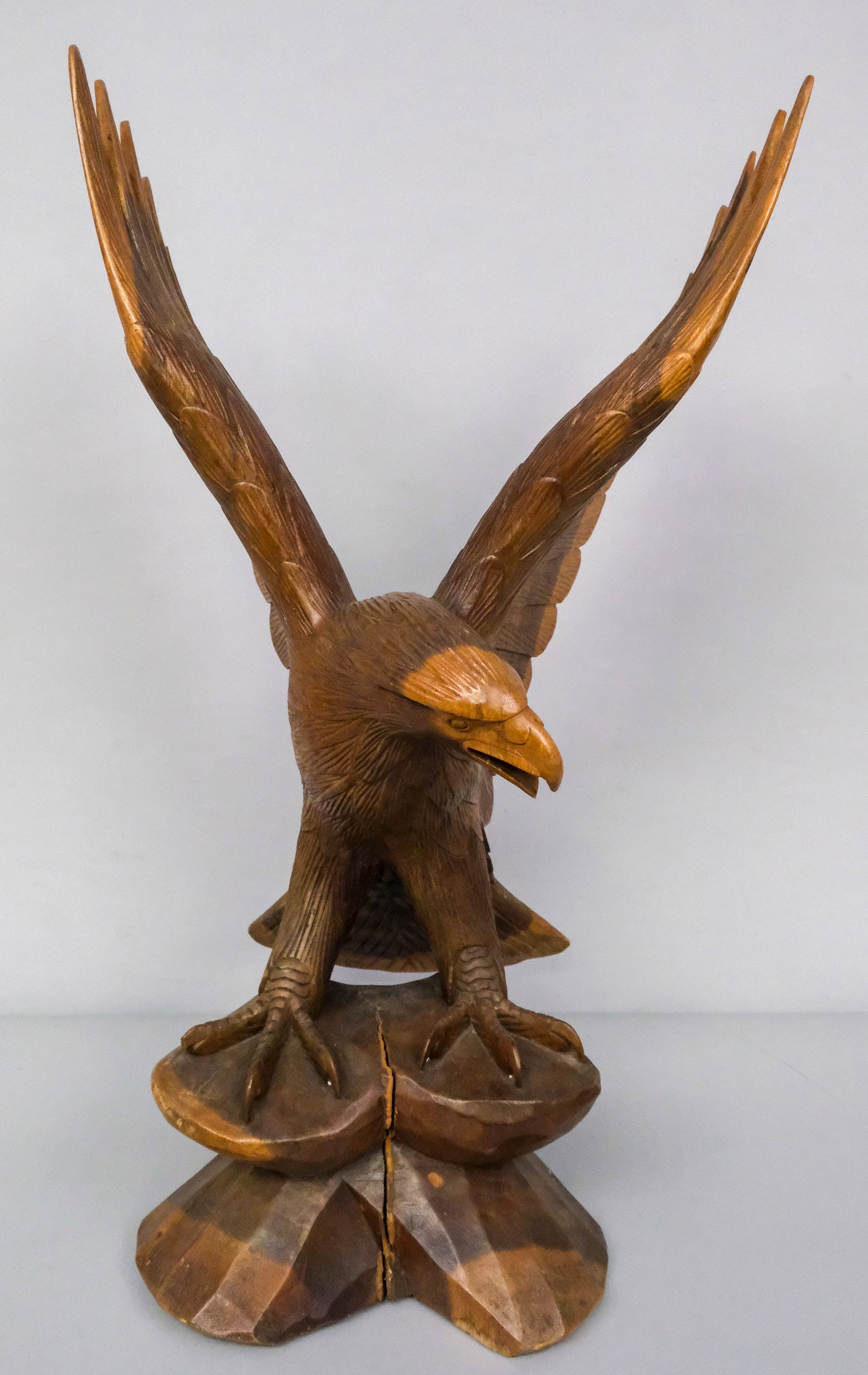 Large Carved Wooden Eagle: Large, vintage carved wooden eagle with wings lifted, 30 1/2" H x 16" W x 14" L.