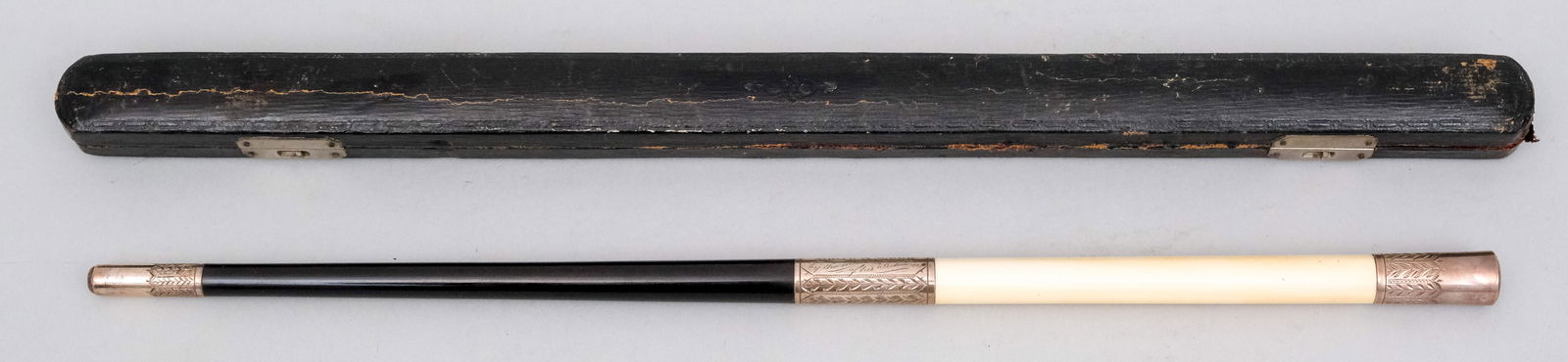 Antique Silver Mounted Conductor's Baton: Silver, bone, and ebony, presented to Harry A. Lyon by his orchestra. In original fitted case. 17 3/8"