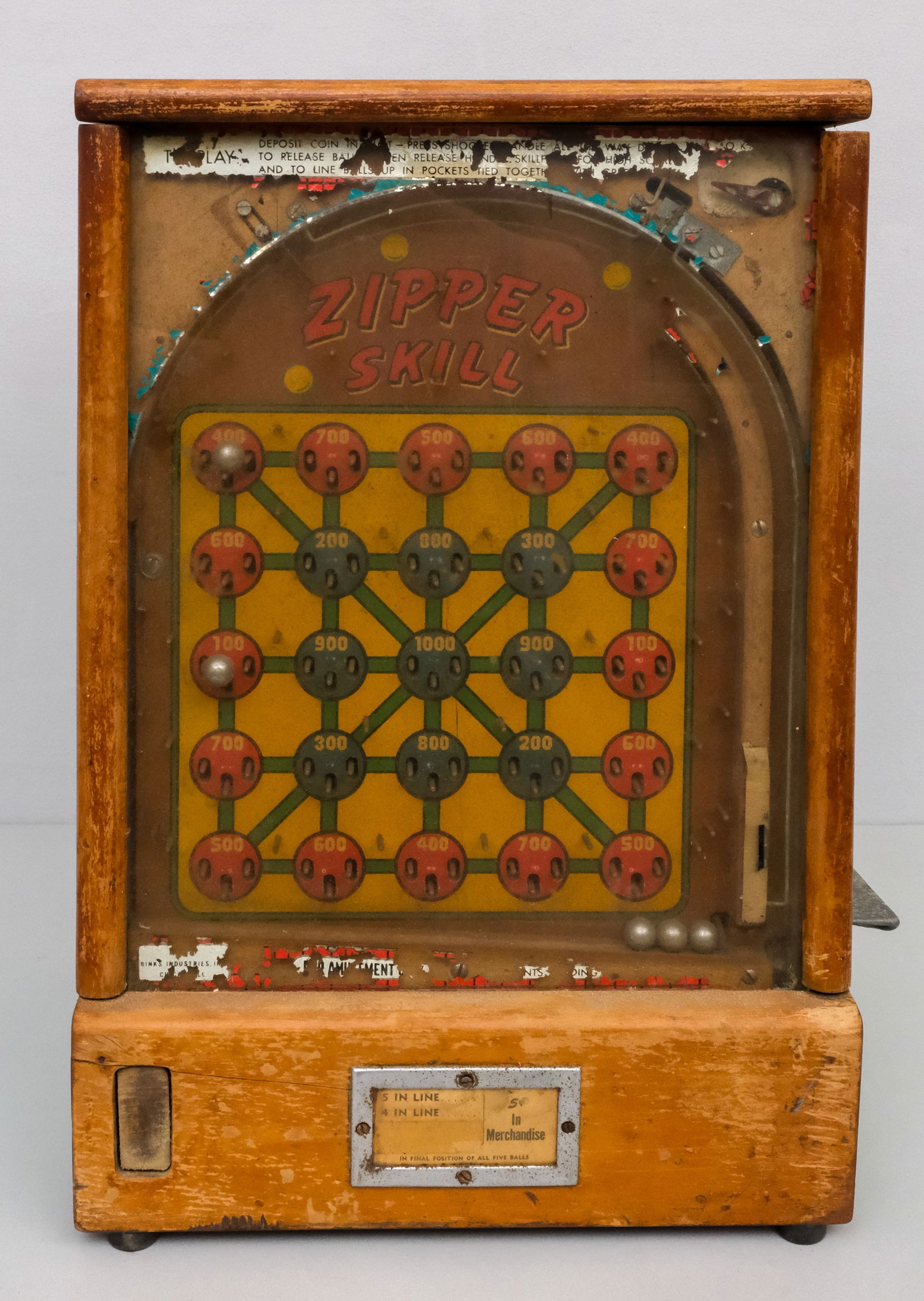 Binks Industries "Zipper Skill" Machine: Binks Industries "Zipper Skill" coin-operated arcade game, circa 1940s, 17 3/4" H x 12" W x 9" L.