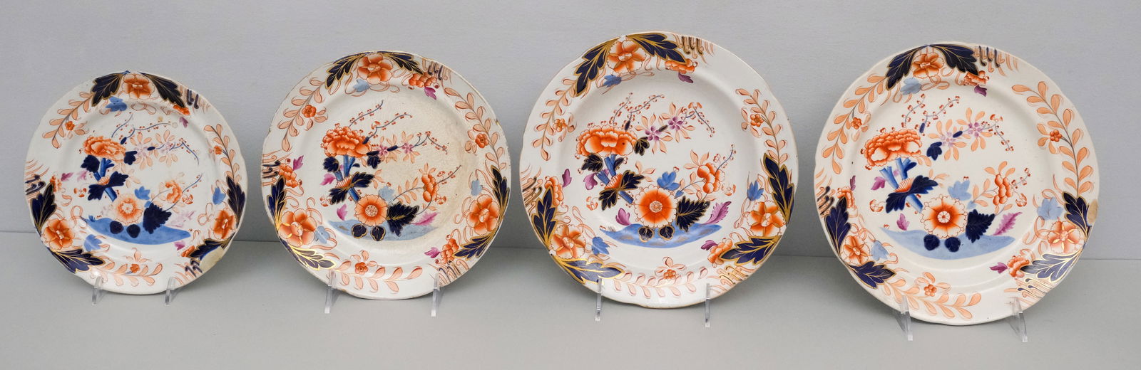Group of Antique Davenport Imari Porcelain: Comprising a dinner plate, two salad plates, and a soup bowl. Dinner plate 9 1/2".