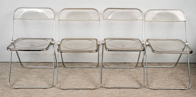 Set of 4 Anonima Castelli Plia Lucite Chairs: Set of 4 mid-century modern Anonima Castelli Plia lucite folding chairs with chrome frames, still in the box, 35" x 18 1/2" folded.