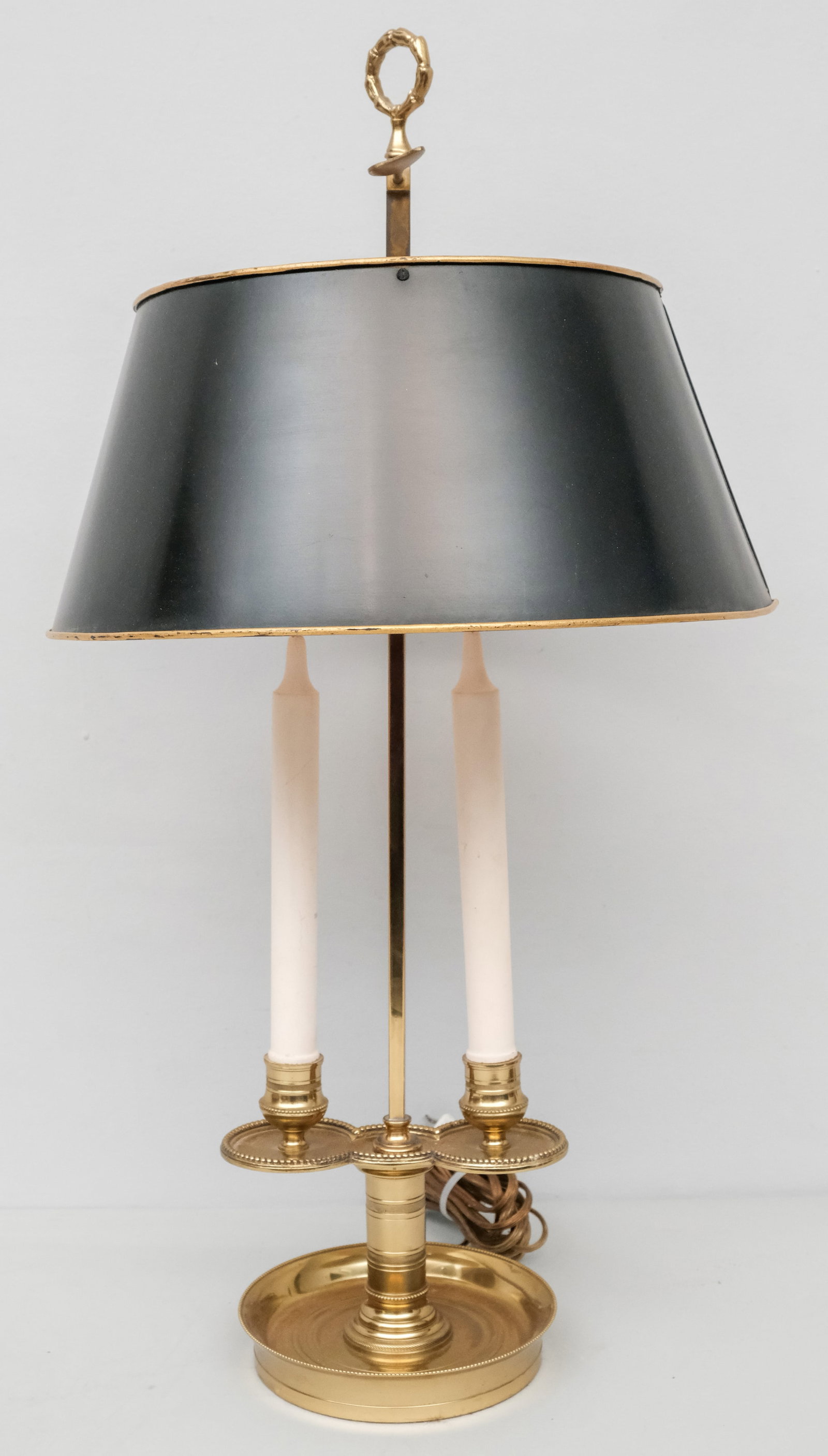 Brass Bouillotte Lamp with Tole Shade: Doubled faux candle sockets. Measures 13" diameter x 24" height.