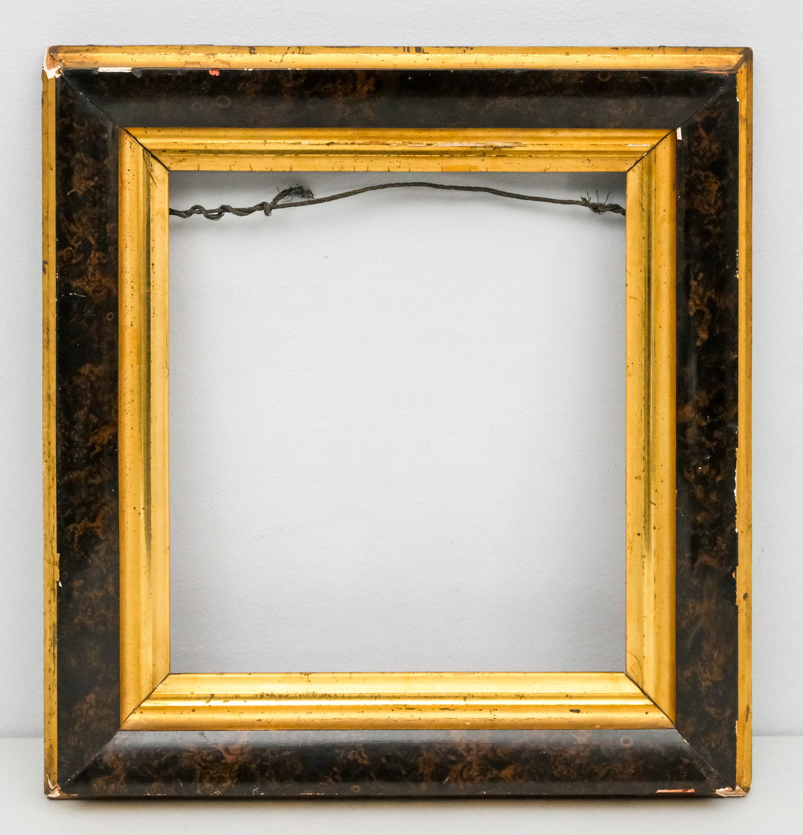 American Eastlake Gilt Frame 8" x 8 1/2": American, ca. 1870, having alternating gilt and ebonized surfaces. Overall 11 1/4" x 12 1/4", rabbet 8" x 8 1/2", molding 2".