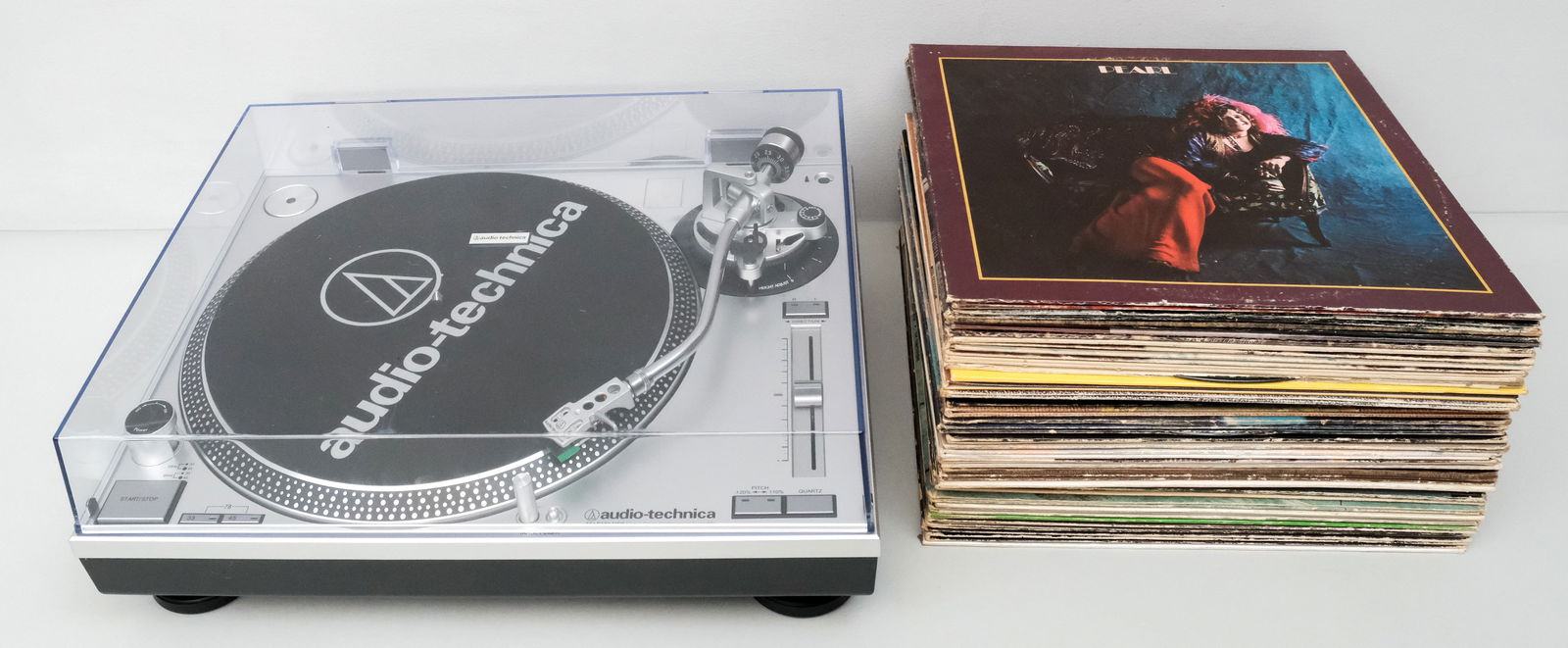 Audio-Technica Record Turntable: Together with a collection of vintage records including Bob Dylan, The Beatles and more.