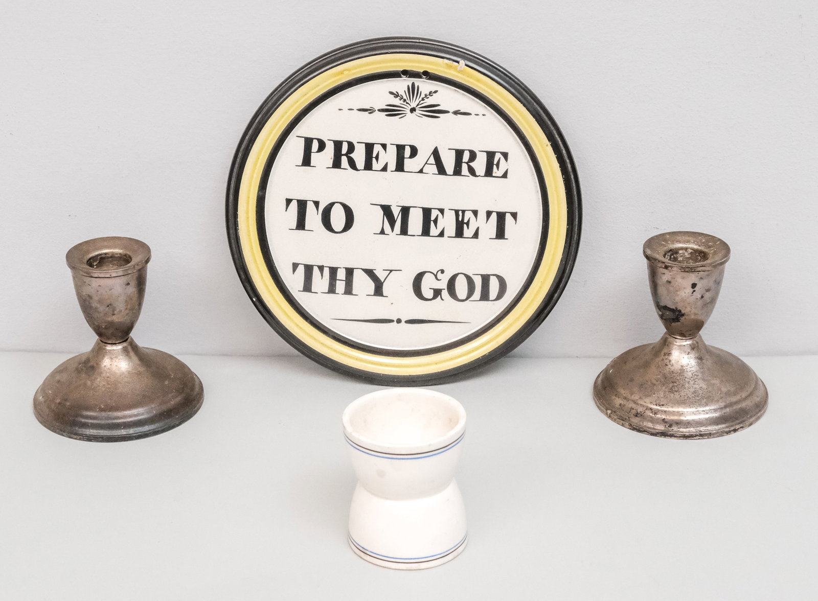Staffordshire "Prepare to Meet Thy God" Plaque: Together with a pair of weighted sterling candlesticks and a Union-Castle Line pottery napkin ring