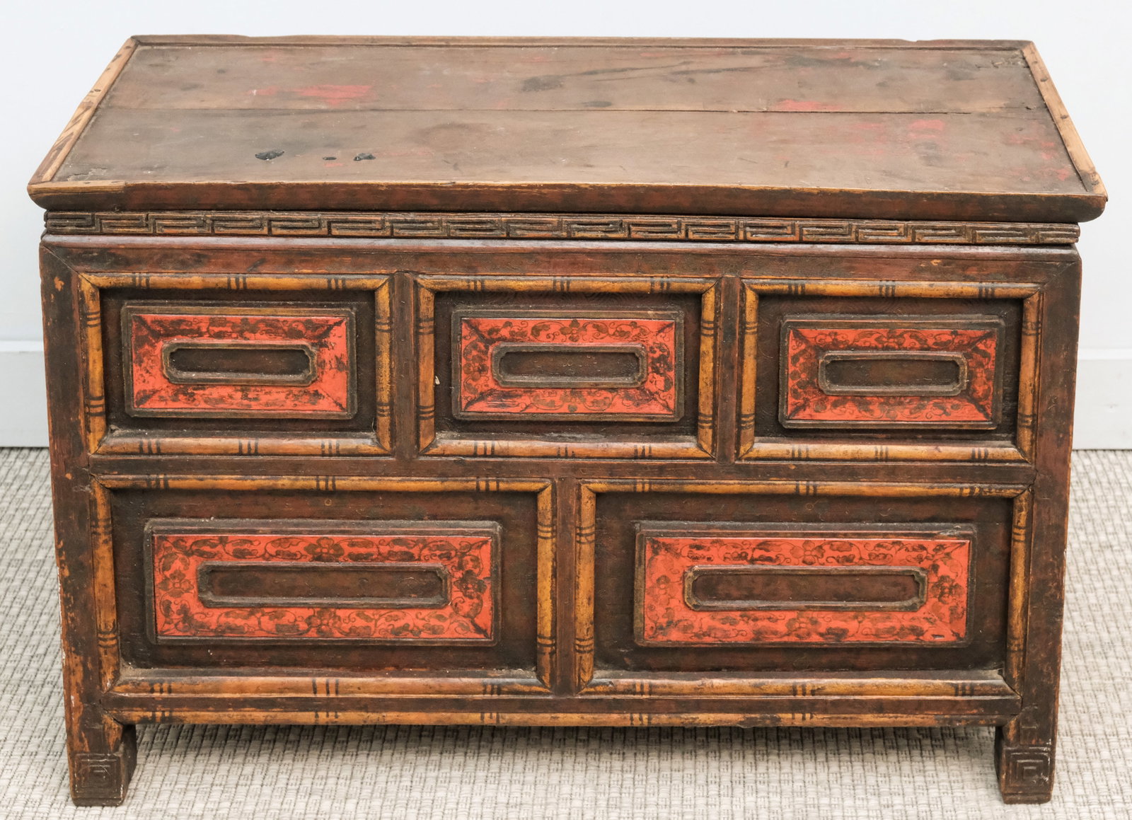 Antique Asian Painted Pedestal with Hidden Door: False drawered stand or pedestal with concealed door on back. Painted and carved surface. Measures 31 3/4" x 21 1/2" x 13 3/4".