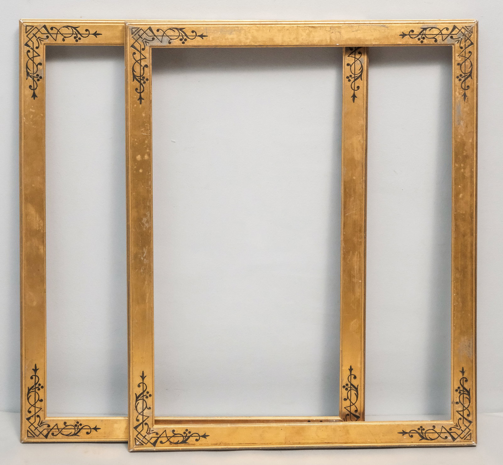 Pair of Aesthetic Gilt Frames 17 1/2" x 21 3/4": American, ca. 1870, having incised decoration at corners. Overall 20" x 24 3/4", rabbet 17 1/2" x 21 3/4", 1 1/2" molding
