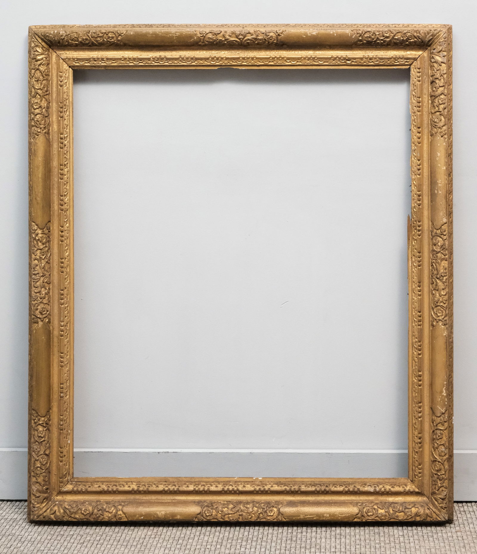 English Lely Giltwood Frame 28 3/4" x 35": English, 18th century, hand carved and gilded in the style favored by Sir Peter Lely. Overall 36" x 42", rabbet 28 3/4" x 35", 4" molding