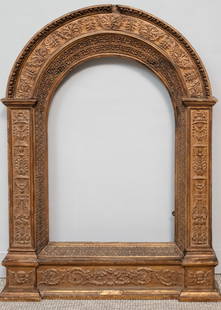 Italian Giltwood Tabernacle Frame 21 1/2" x 31 1/2: Italian, 19th century, having elaborate decoration with candelabrum, putti, and 3-dimensional sight edge, label from Metropolitan Museum verso. Overall 36" x 47 1/2", rabbet 21 1/2" x 31 1/2", 7 1/2"