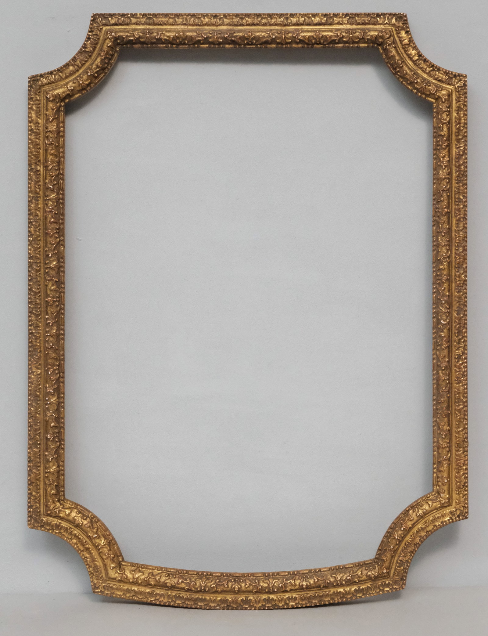 Louis XVI Giltwood Mirror Frame 17 3/4" x 25 1/4": American, 20th century, finely carved and gilded replica frame. Overall 20 3/4" x 28 1/4", rabbet 17 3/4" x 25 1/4", 1 3/4" molding