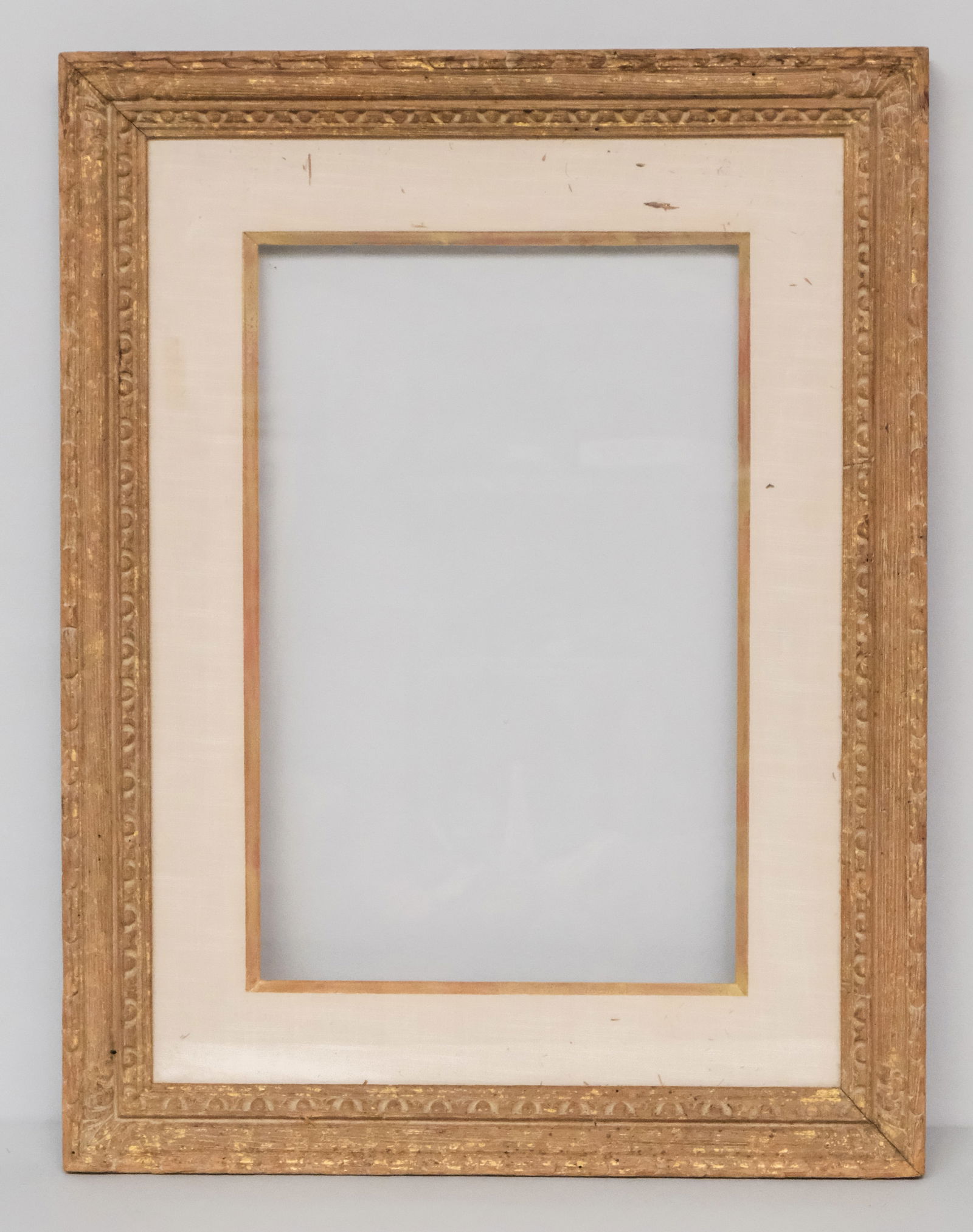 Heydenryk Modernist Frame 13" x 20": House of Heydenryk, ca. 1940, carved chestnut with silk panel liner and gilt sight edge under glass, label verso. Overall 22 1/2" x 29 1/2", rabbet 13" x 20", 5" molding