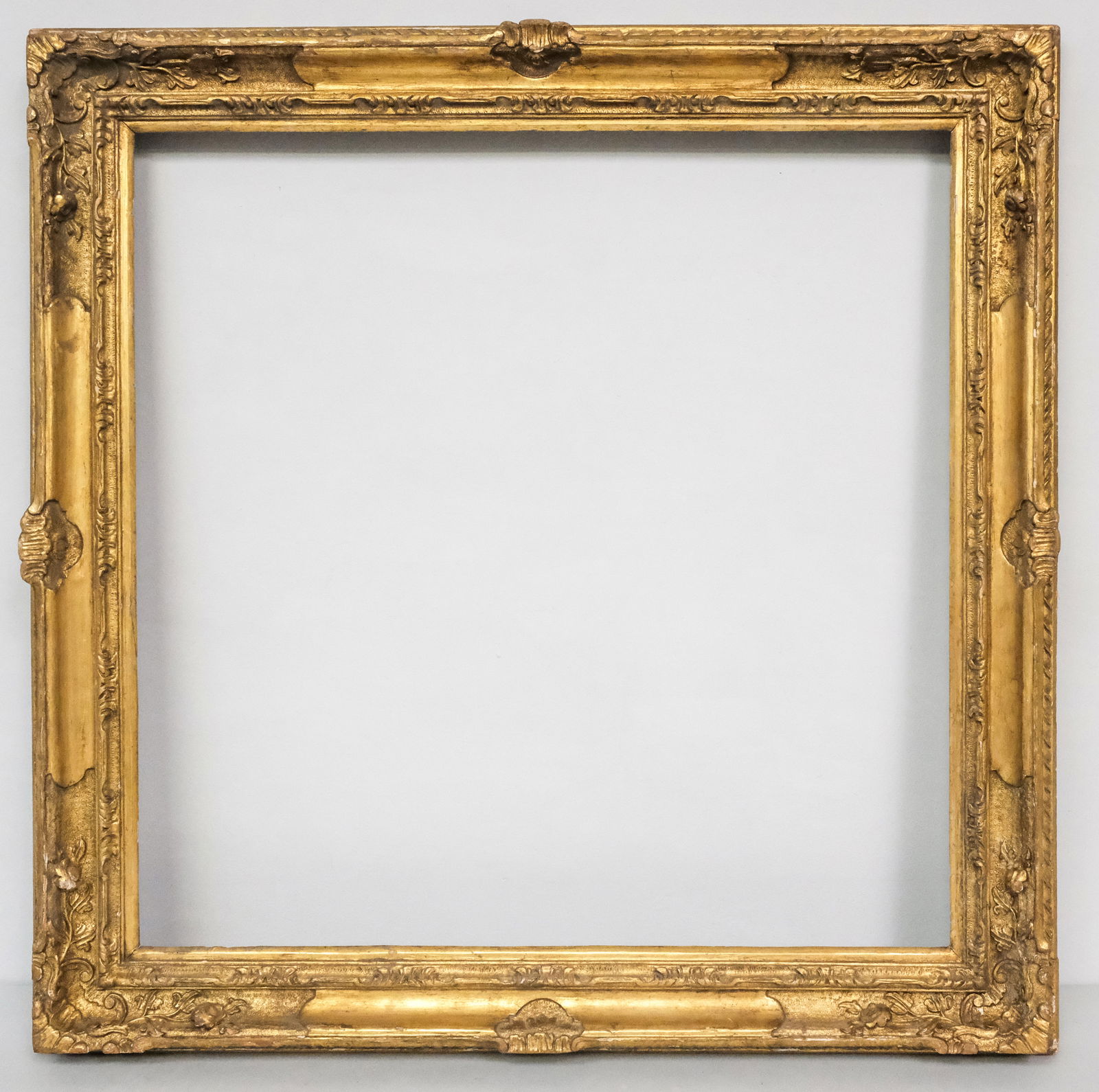 Italian Giltwood Canaletto Frame 25" x 25": Italian, ca. 1880, carved and gilded in the style of Canaletto. Overall 31 1/4" x 31 1/4", rabbet 25" x 25", 3 1/4" molding