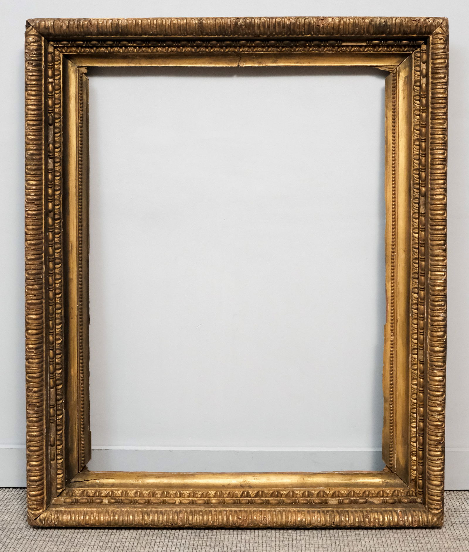 Early English Giltwood Frame 29 1/2" x 40 1/4": English, 18th century, carved and gilded in the Italian taste. Overall 39 1/2" x 48 1/2", rabbet 29 1/2" x 40 1/4", 5 1/2" molding