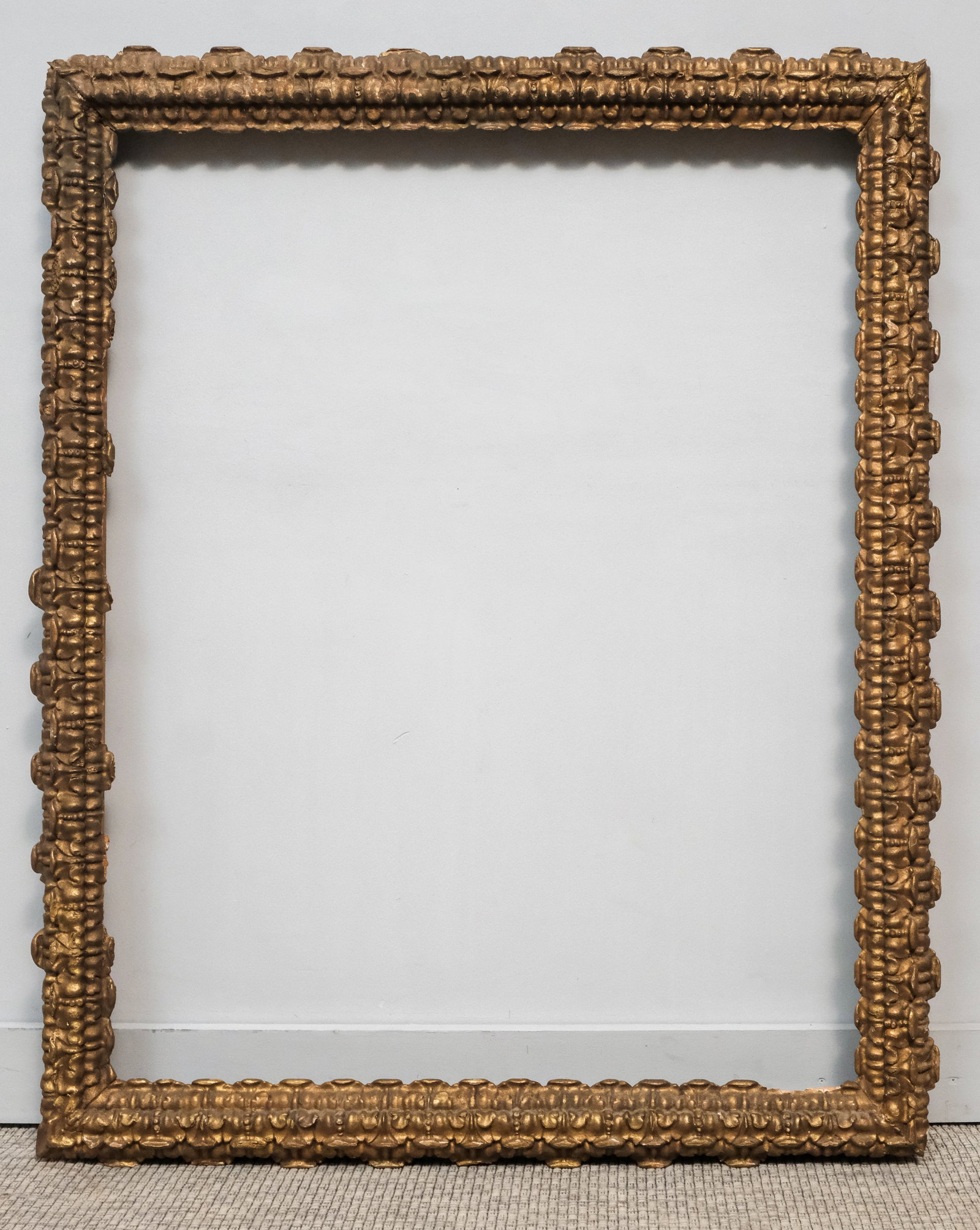 Early Italian Giltwood Frame 33" x 42": Italian, 18th century or earlier, having carved and gilded repeating acanthus ornament. Overall 38 1/2" x 47 1/2", rabbet 33" x 42", 4" molding